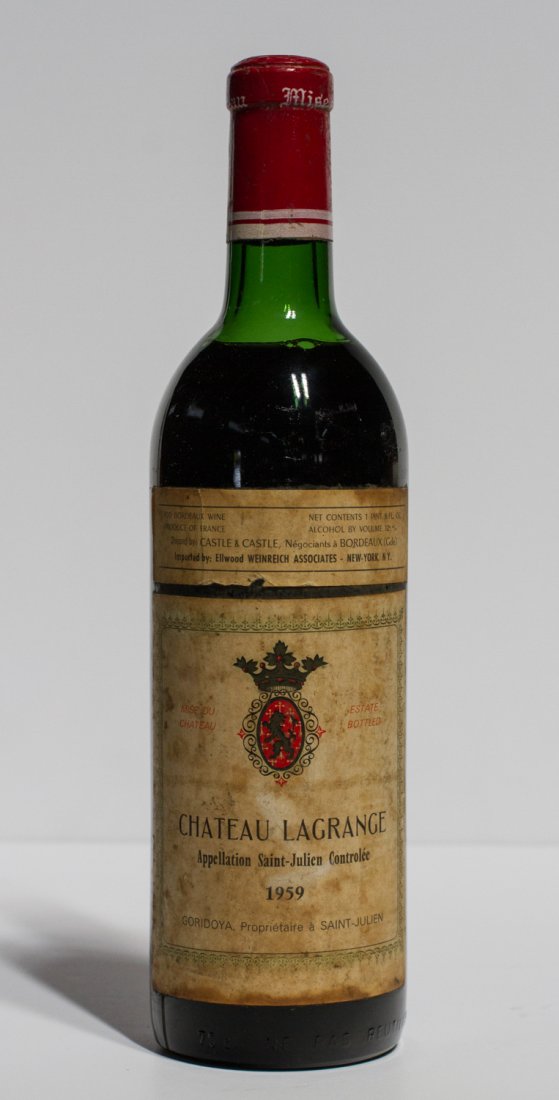 Chateau LaGrange Saint Julien 1959 French Bordeaux Wine: Chateau La Grange - Saint Julien 1959 French Red. Bordeaux Red Wine. Very high shoulder. The bottle and label are in good condition, the label has some browning. The wine has been well maintained and 