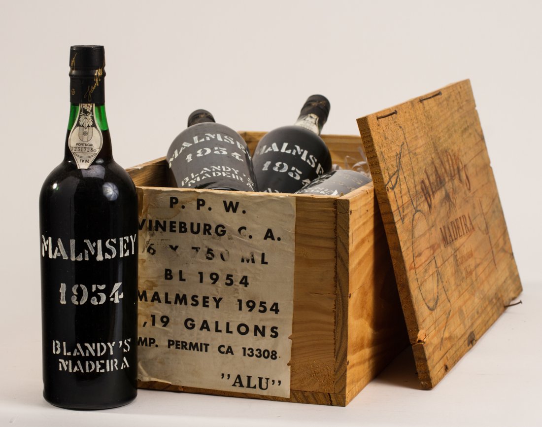 Case of 4 Blandy's Malmsey Madeira 1954 Vintage w Crate: Case of 4 Blandy's Malmsey Madeira 1954 Vintage. Portugal. Base Neck fill. The sealed bottles and labels are in good condition. The Madeira wine has been well maintained and stored in a temperature an
