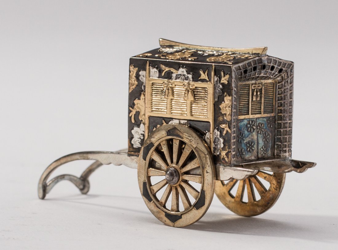 Two Pairs of Japanese Sterling Silver Salt Cart Shakers: Two Pairs of Japanese Sterling Silver Figural Salt and Peppers. The first pair are .950 figural rickshaw wheeled carts decorated with black enamel and vermeil. The second pair are gourd shaped salts w