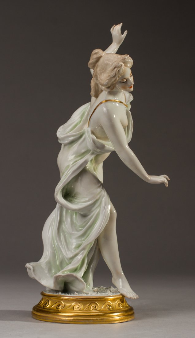 Semi-Nude Fine Capodimonte Porcelain Woman Figure: Italian Capodimonte Semi-Nude Porcelain Figure of a Woman. Delicate figurine depicts a woman dancing on a gilt decorated base. In good condition. Measures 9.5 inches in height.