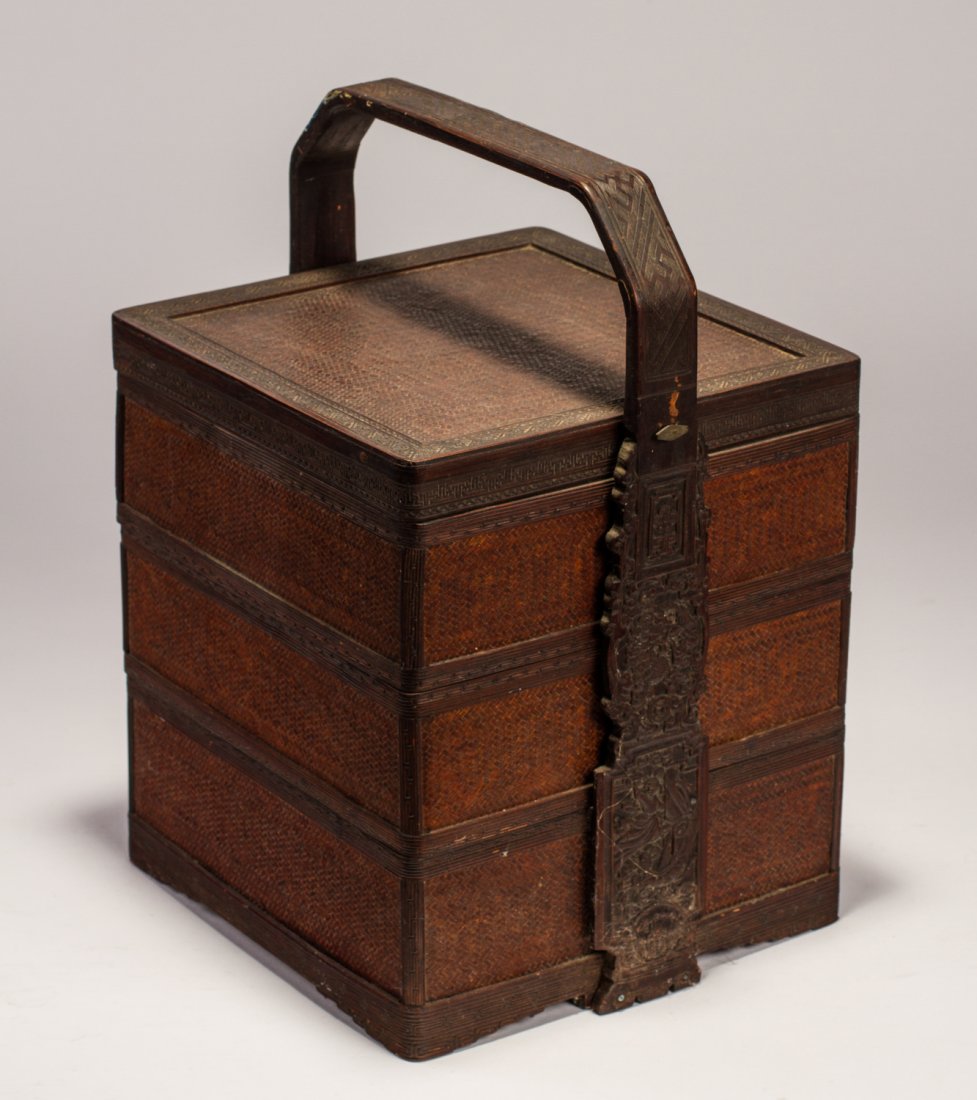Chinese 1920s Woven Carved 4-Section Picnic Basket: Chinese 1920's Woven and Carved Four Section Picnic Basket. The Chinese basket has a finely carved handle, which depicts a dragon and women amidst flowers with a bat at the bottom. The flat woven bask