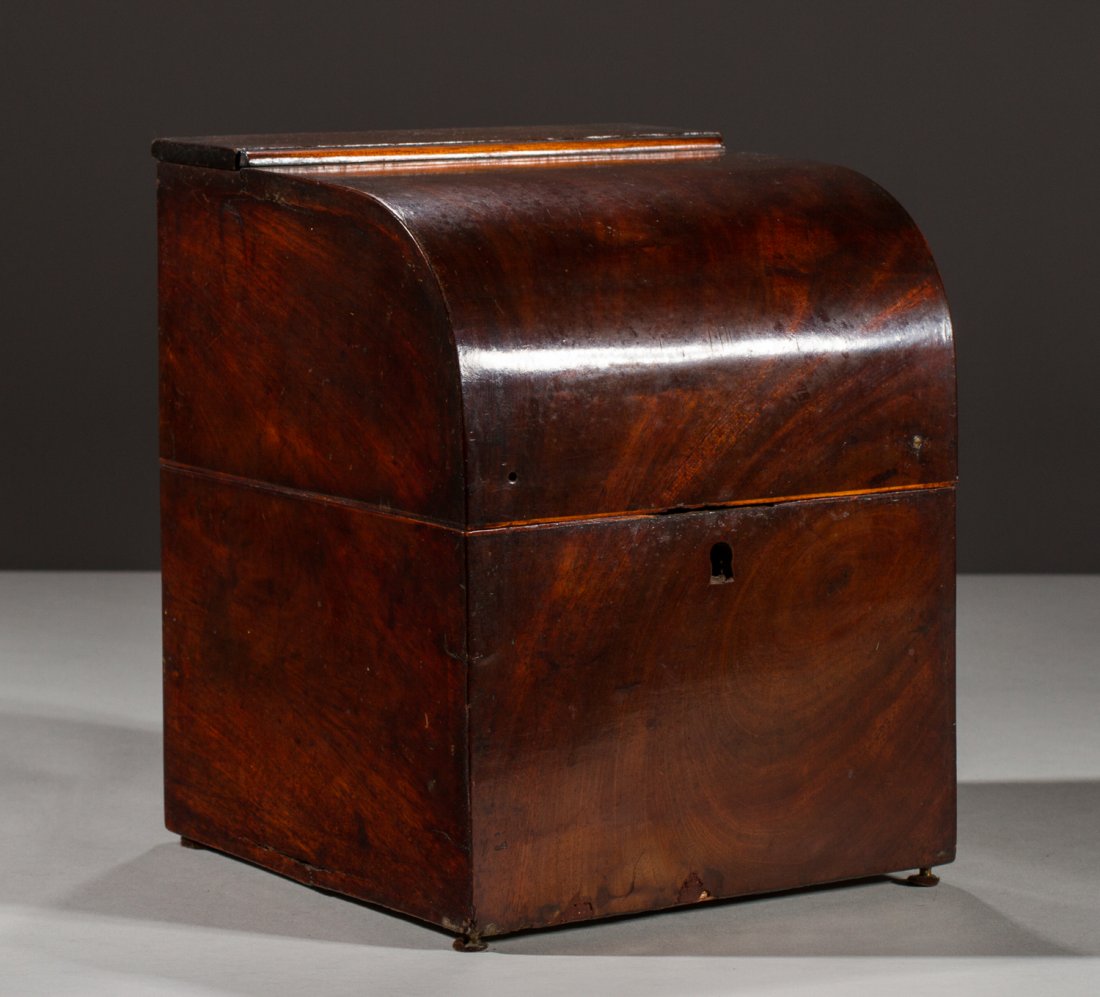 English 19C Mahogany Traveling Liquor Decanter Set: English 19C Mahogany Domed Traveling Liquor Decanter Set. The 19th century decanter set has four early Stiegel type glass bottles, each with a different shaped stopper and a single wine glass fitted t