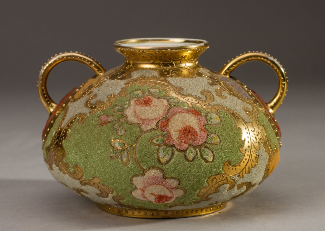 Handpainted Nippon Japanese Coralene Floral Vase: Japanese Handpainted Nippon Coralene Porcelain Decorated Vase. Decorated with coralene encrusted glass bead decoration of roses on one side and blue florals on green on the other. The double-handed lo
