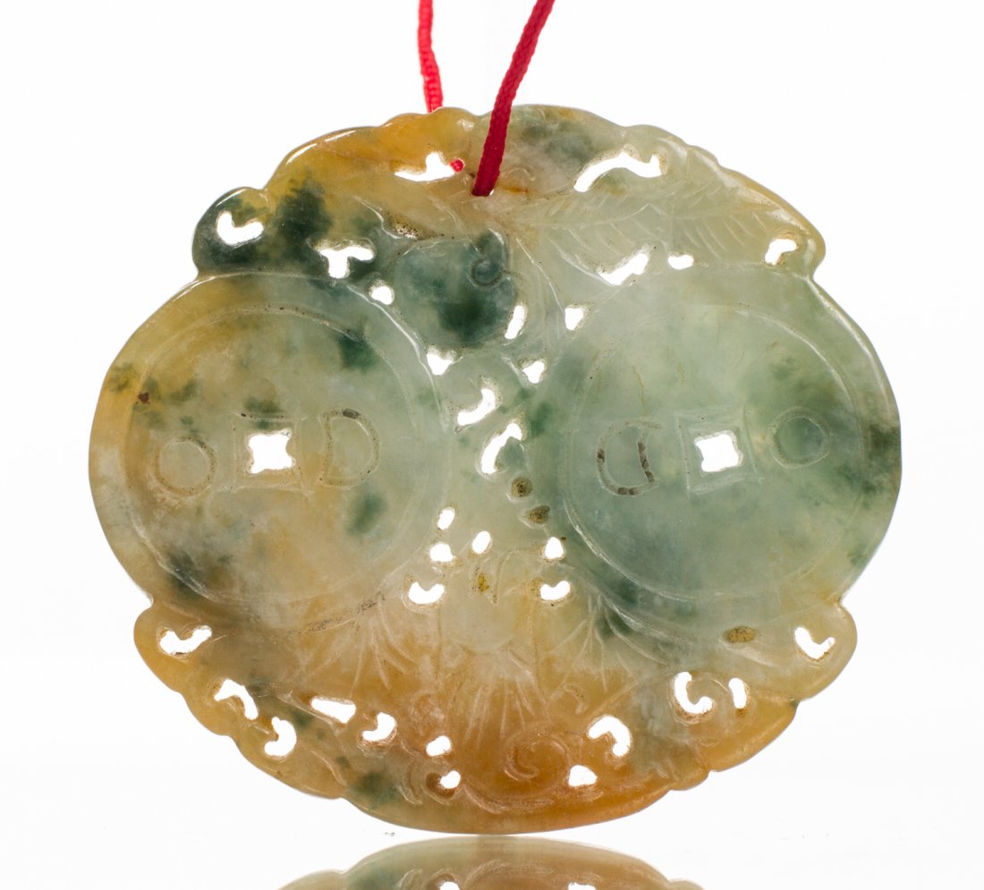 Chinese Carved White Jade Coin Necklace Pendant: Chinese Carved White - Green Jade Necklace Pendant. Variegated color; varies from dark to light green spinach green, mutton fat and white. The pierced incised carving depicts two Chinese coins. Measur