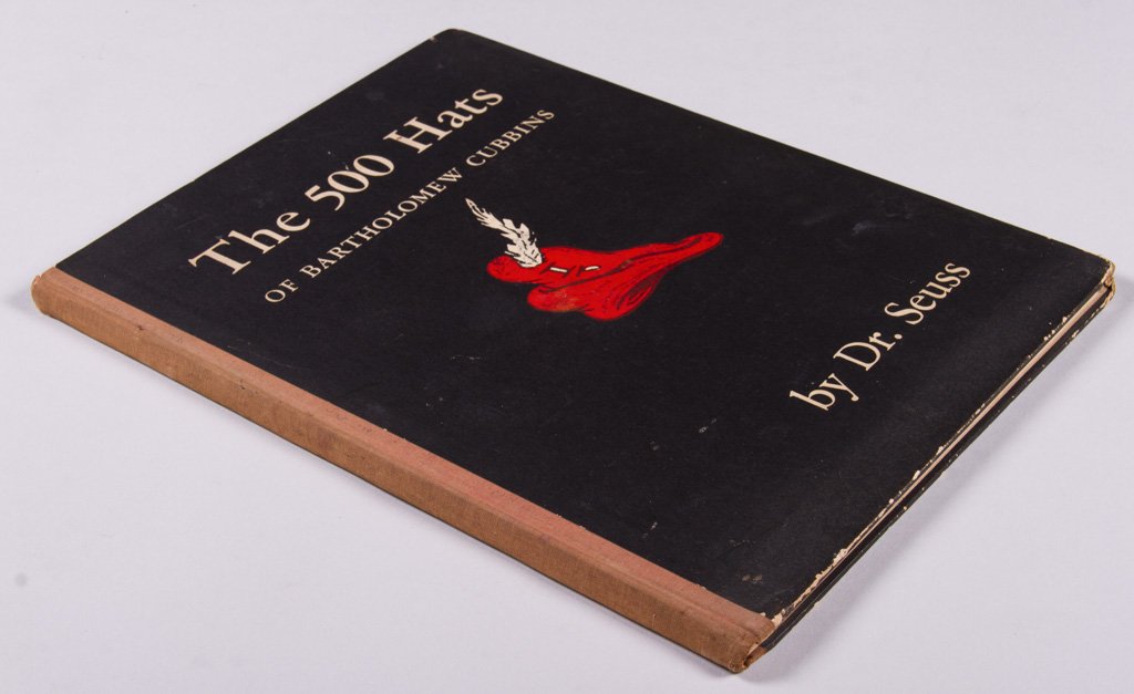 Seuss Dr. "The 500 Hats of Bartholomew Cubbins" Book: Seuss, Dr (Theodor Seuss Geisel) (American, 1904-1991) “The 500 Hats of Bartholomew Cubbins.” Book. The Vanguard Press, New York. Copyright 1938. First Edition, Hardcover, no dust jacket, 1938. 91