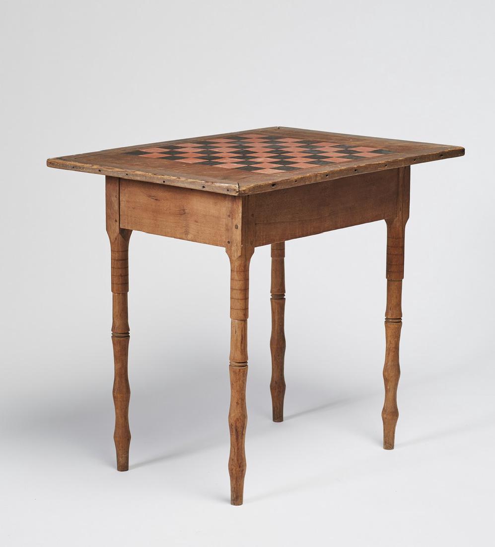 Painted 19th Century Country Checkerboard Table: Painted 19th Century Country Checkerboard Table. The 19th century table is made up. The handmade pegged hardwood base has ring turning with a added antique breadboard top with a framed painted black a
