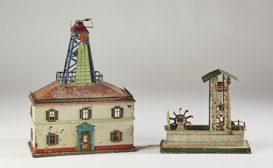 GBN German 19C Tin Windmill, Waterwheel Beach Toy: GBN German 19C Tin Windmill, Waterwheel Beach Carts. This lot of old tin toys includes the windmill, waterwheel,two tin beach carts and a cloth toy merry go round camel with a few extra parts. Found w
