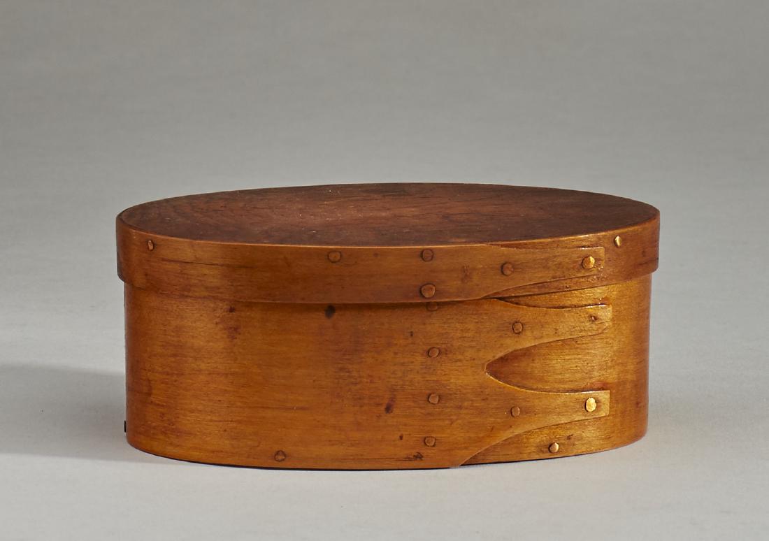 Shaker 19C Three Finger Oval Box: Shaker 19C Three Finger Oval Box. The 19th century box has an old varnish finish. Measures 2 inches high and 4.7 inches long. In good condition. Notes: Thank you for your bid! Please keep in mind that
