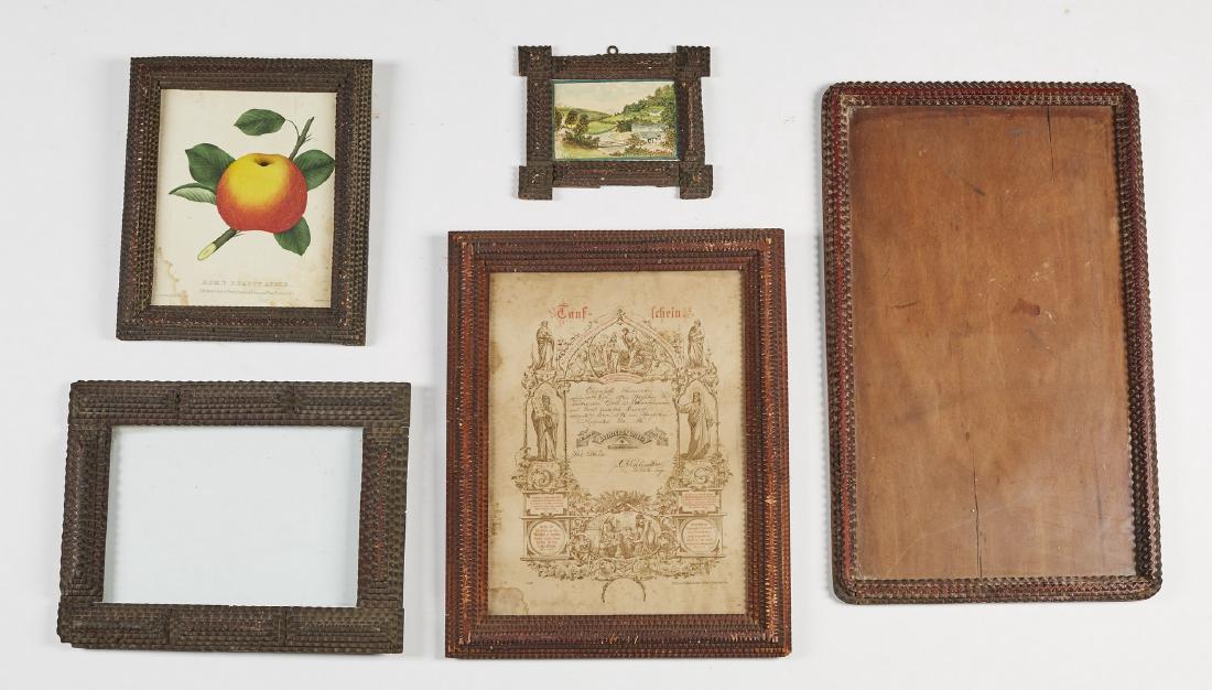 Group of Five Old Carved Tramp Art Frames: Group of Five Old Carved Tramp Art Frames. The frames range in size from the largest at 23 inches high by 14 inches wide, the smallest 8.7 inches high by 7.3 inches wide. In good condition. Sold toget