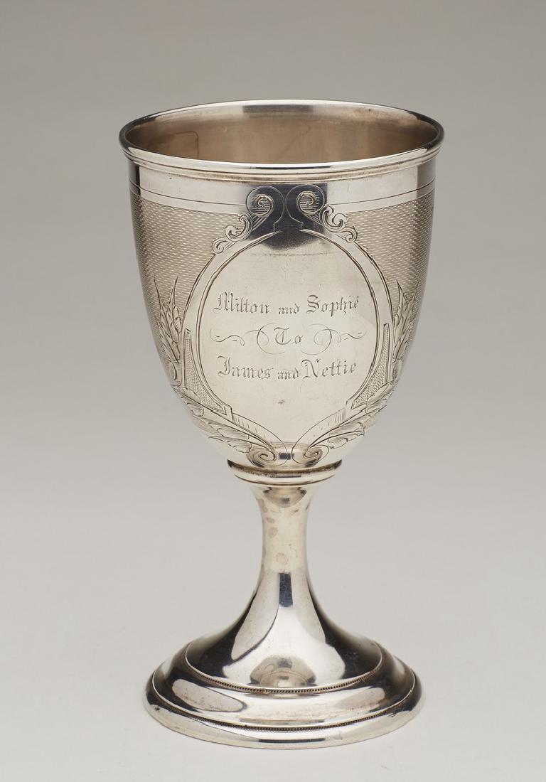 American 19C Coin Silver Presentation Goblet: American 19C Coin Silver Presentation Goblet. The 19th century goblet is decorated with engine turning and a leaf framed central medallion marked -- Milton and Sophie to James and Nettie. No hallmark.