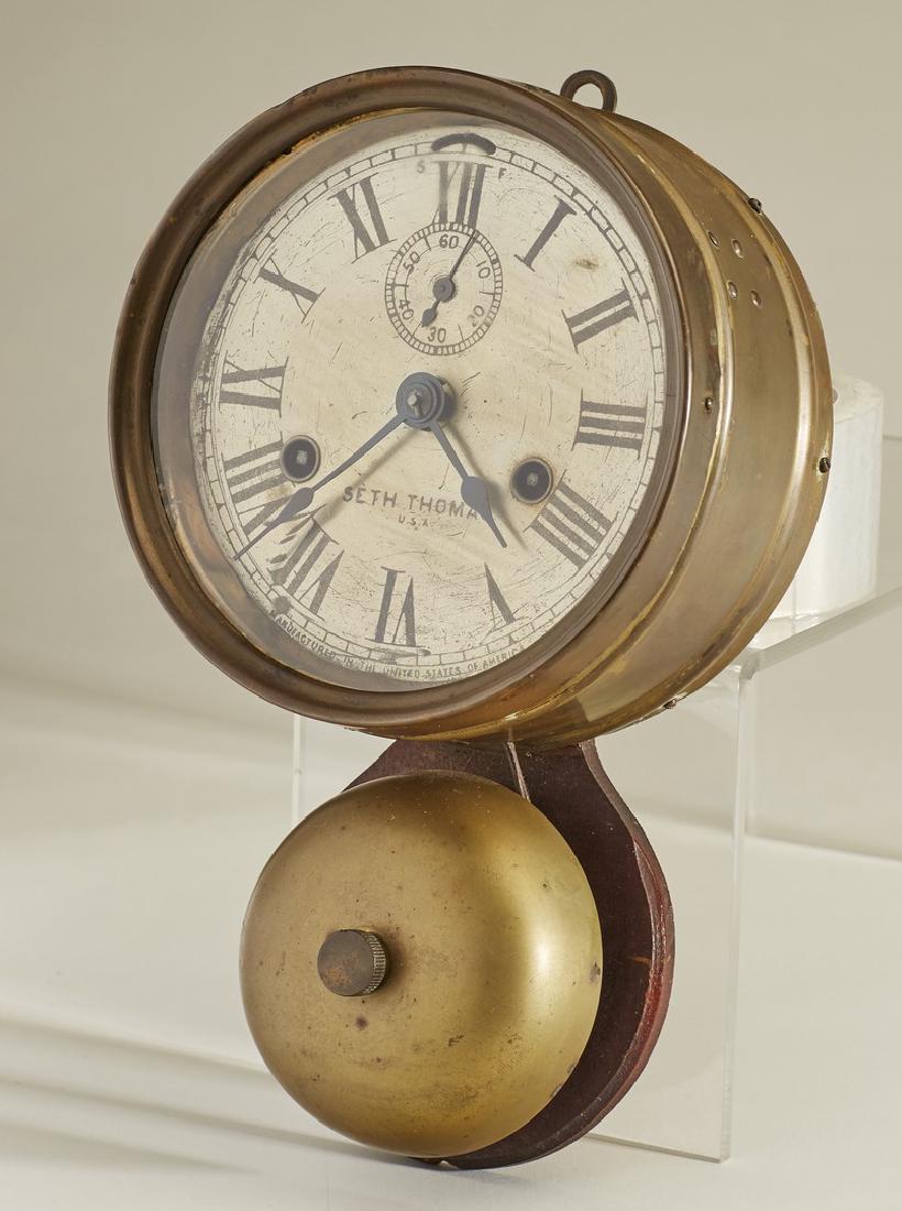 Seth Thomas Brass Nautical Ships Bell Clock: Seth Thomas Brass Nautical Ships Bell Clock. The shipâ€™s clock is running and striking at this time the glass is glued in and missing its original interior fitter ring. Measures 10.5 inches high