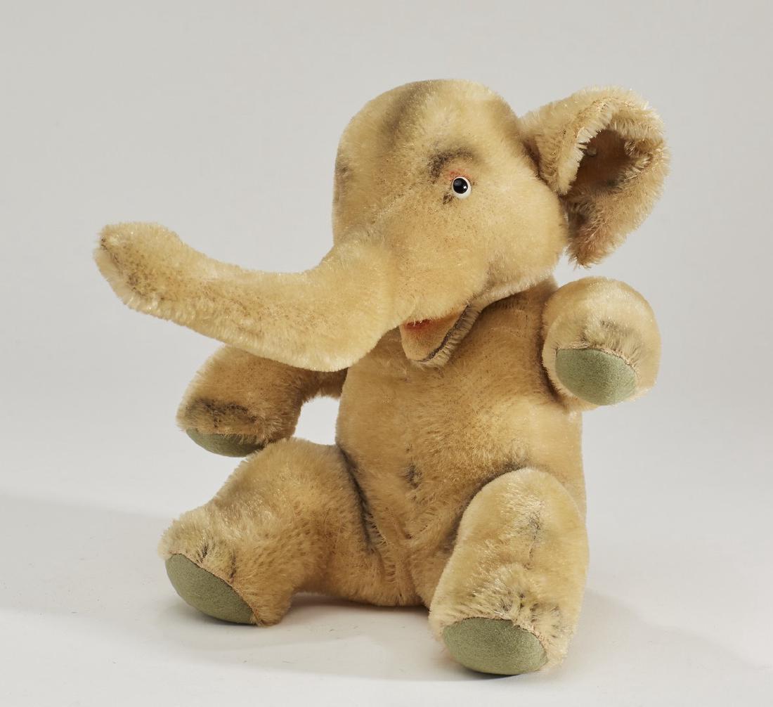 Old Steiff with Button Seated Mohair Elephant Toy: Old Steiff Large Seated Mohair Elephant Toy. The old stuffed animal elephant toy has a button in his ear. In good condition. Measures 9 inches high. Notes: Thank you for your bid! Please keep in mind 