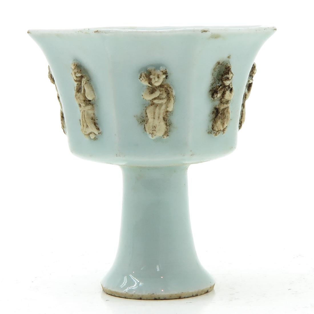 Stem Cup: Blue decor with figures, 9 cm. tall.