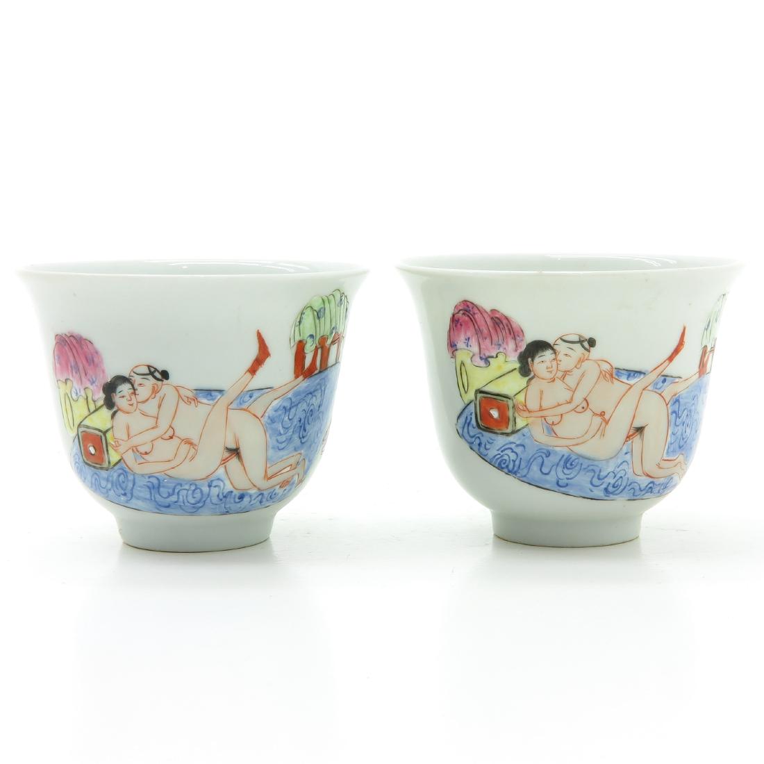 Lot of 2 Cups: Depicting erotic scene, marked with seal mark on the bottom, 8 cm. in diameter.