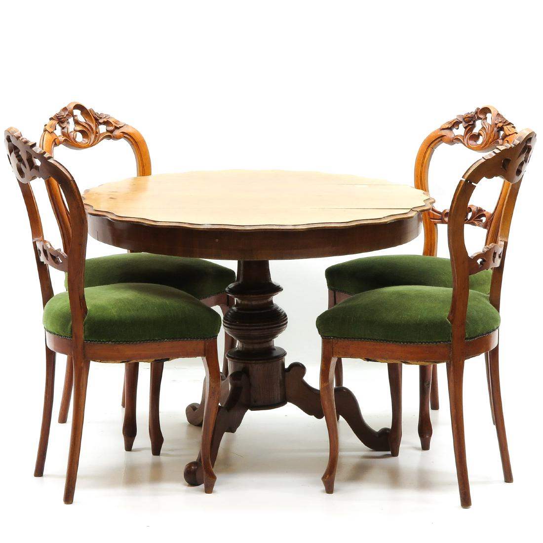 Biedermeir Table and 4 Chairs: Table is 100 cm. in diameter.