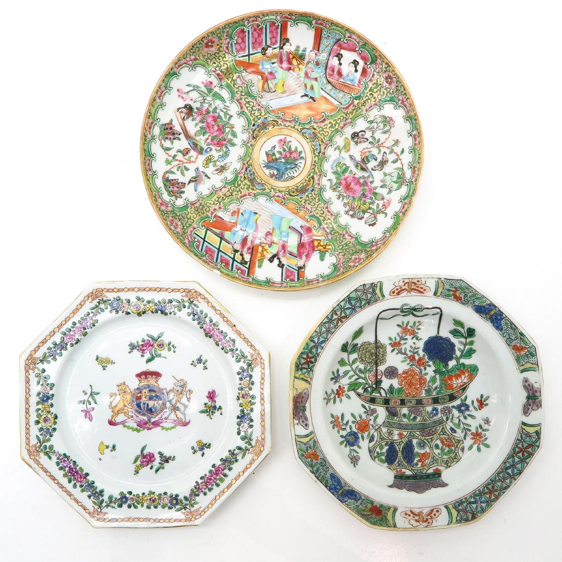 Lot of 3 Plates: Including plate with Famille Weapon, largest plate is 25 cm. in diameter, in diverse conditions.
