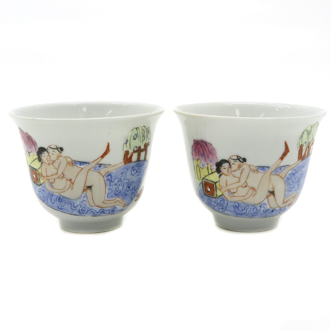 Lot of 2 Erotic Decor Cups: Polychrome, marked with seal mark on the bottom, 8 cm. in diameter.