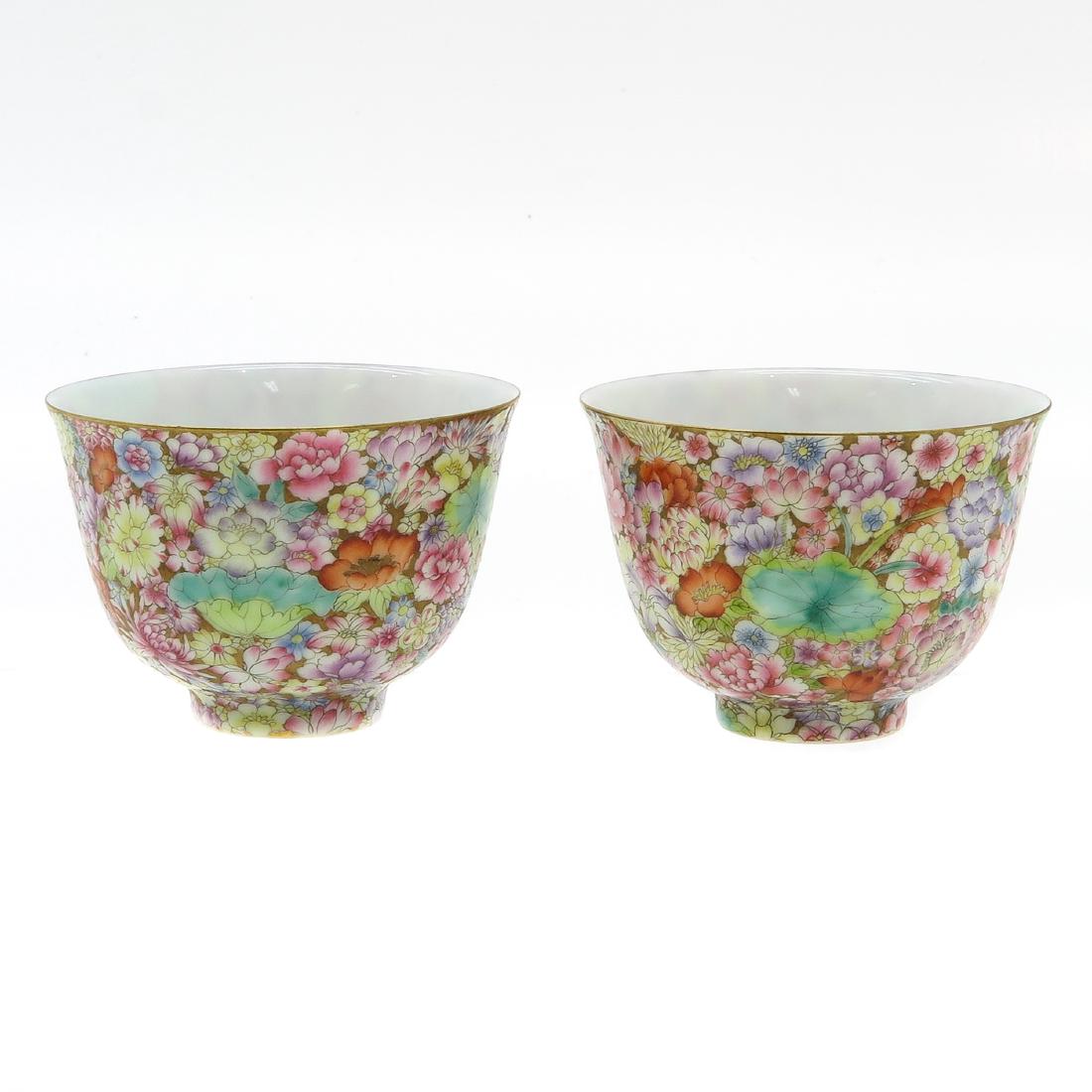 Lot of 2 Cups: Mille Fleur decor, marked with seal mark on the bottom, 9 cm. in diameter.