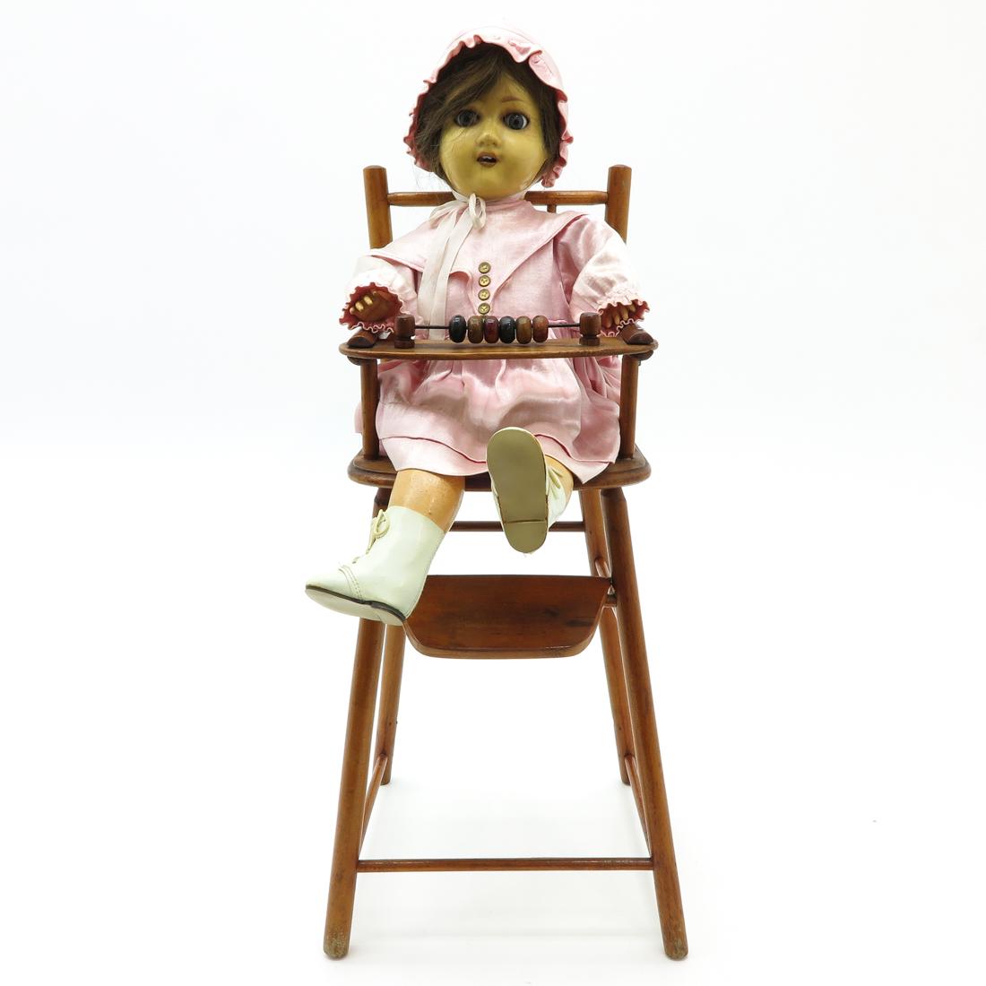 Vintage Doll in High Chair (1 of 2)
