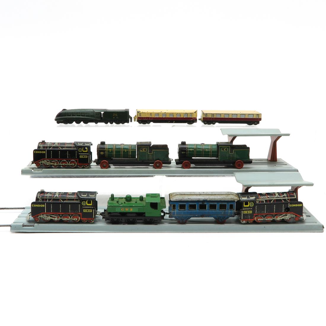 Diverse Lot of Tin Trains & Accessories (1 of 1)