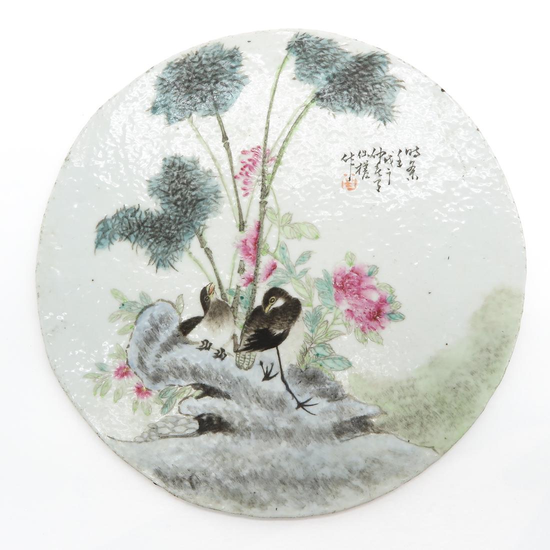 Round Tile: Depicting birds with signed Chinese text, 24 cm. in diameter.