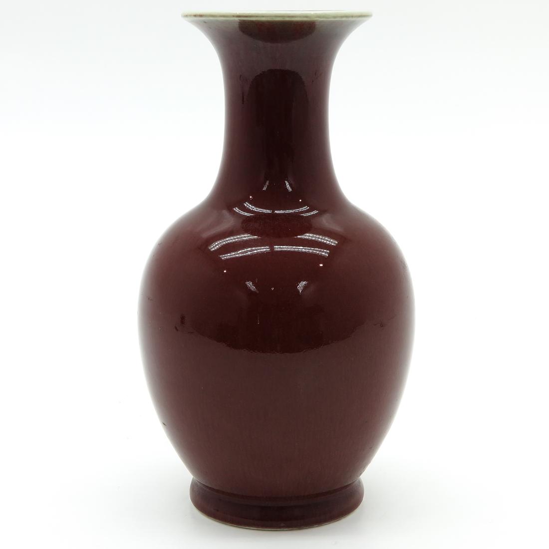 Vase: Sang de Boeuf decor, bottom has hairline & hole.