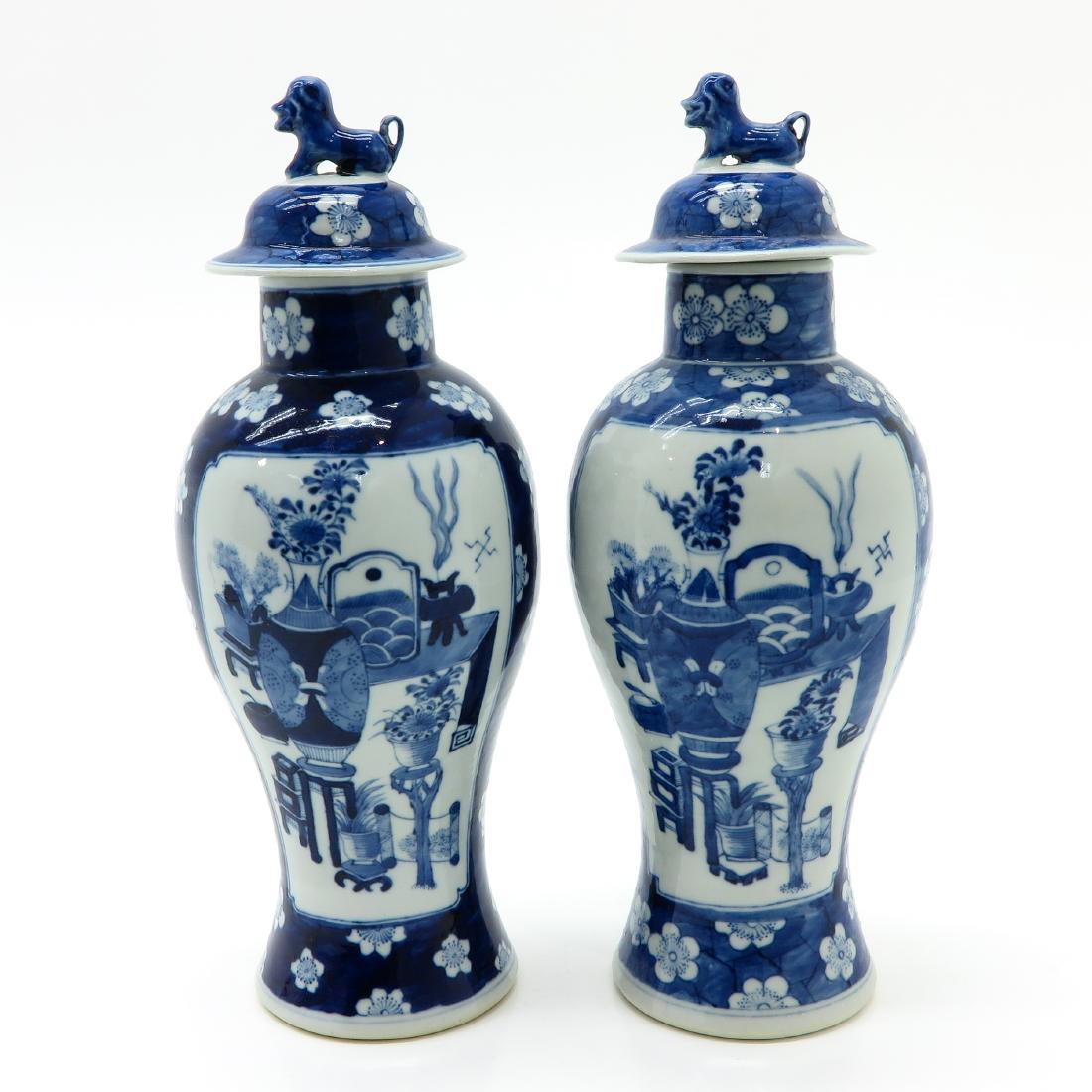 Pair of Blue and White Lidded Vases (1 of 6)