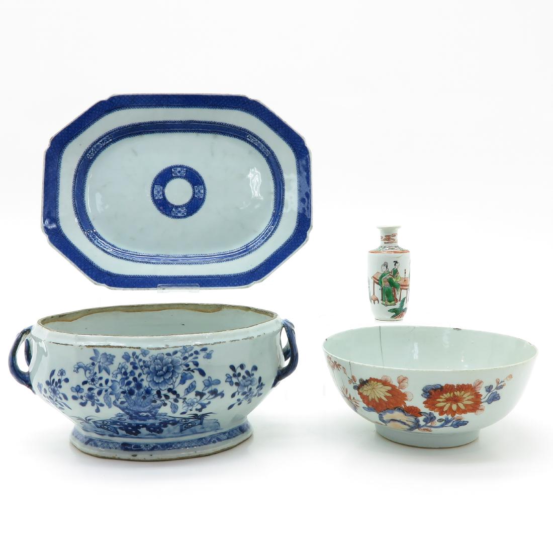 A Diverse Lot of Porcelain: Including serving platter, toureen, large bowl and small vase, platter is 36 x 27 cm., in diverse conditions.