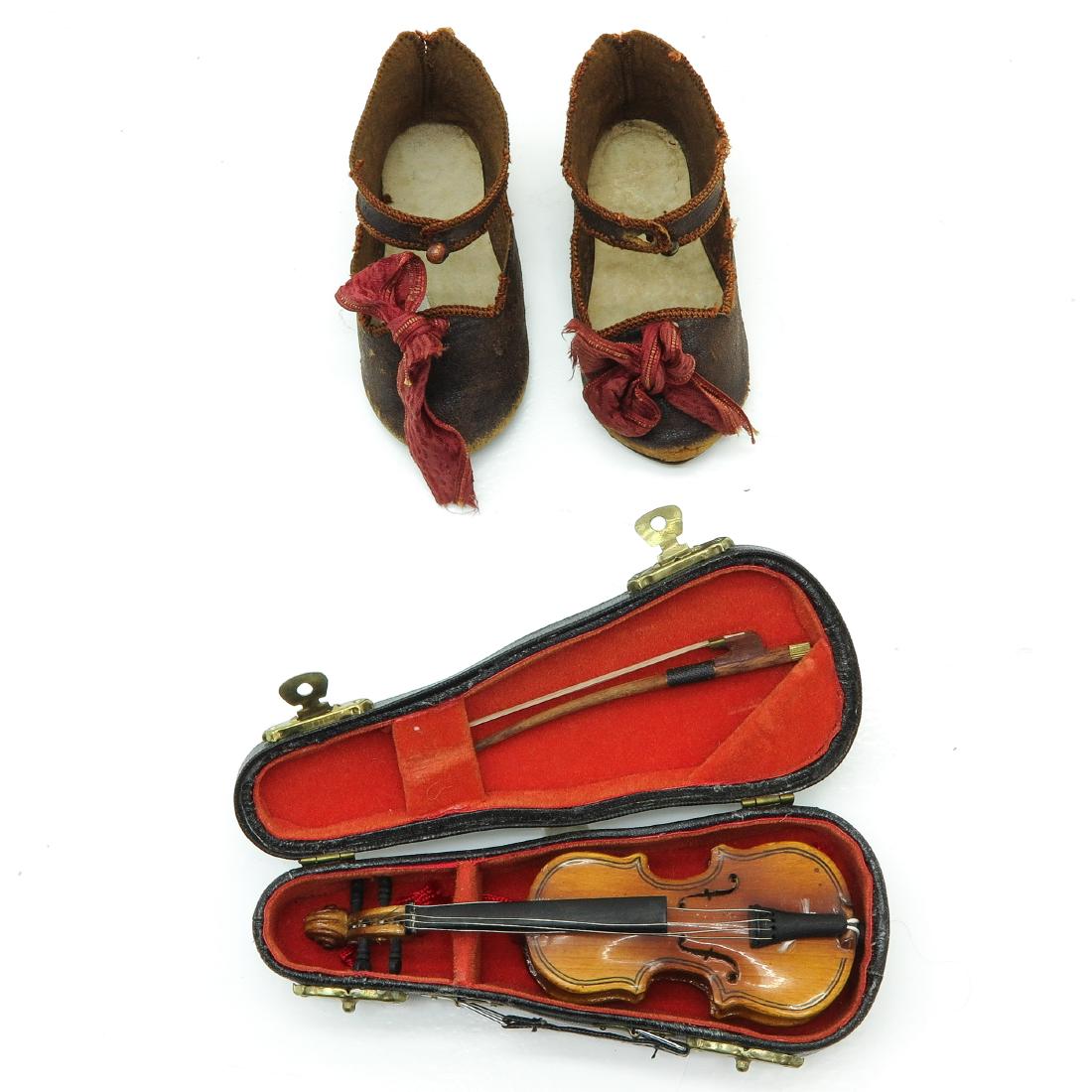 A Pair of Antique Jumeau Shoes and Miniature Violin (1 of 2)