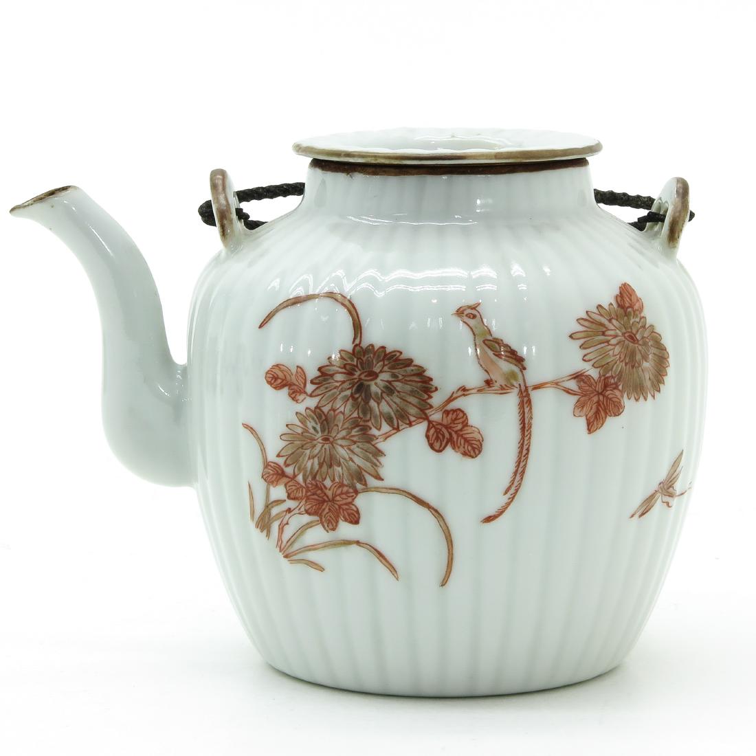 An Iron Red and Gilt Decor Teapot: Floral and bird decor, 10 cm. tall.