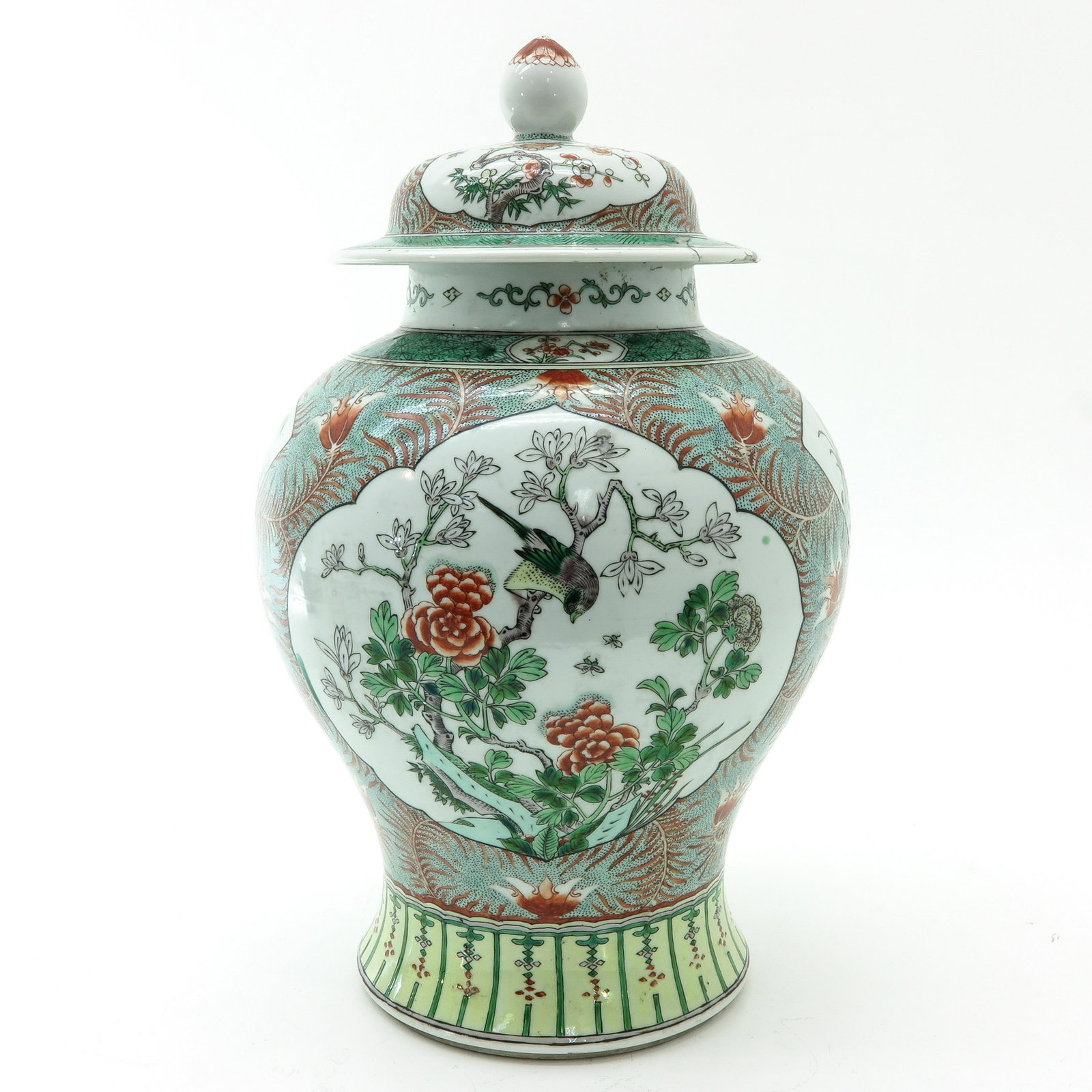 A Famille Verte Helmet Jar with Cover: Floral decors, marked with double ring, 44 cm. tall, jar with hairline and chip on rim, cover with restoration on edge.