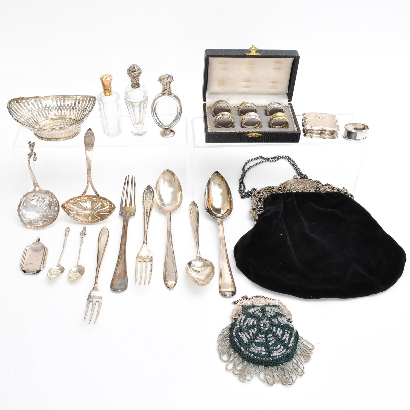 A Diverse Collection of Items: Including a silver pill box, perfume vial with 14 KG top along with other diverse item.