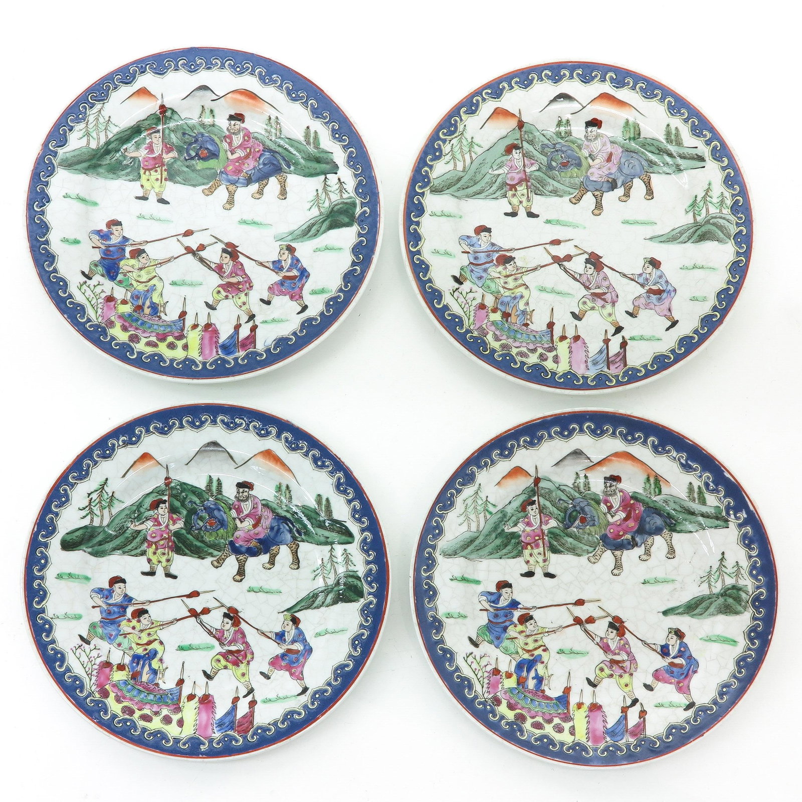 A Series of 4 Polychrome Decor Plates: Depicting warriors, 26 cm. in diameter.
