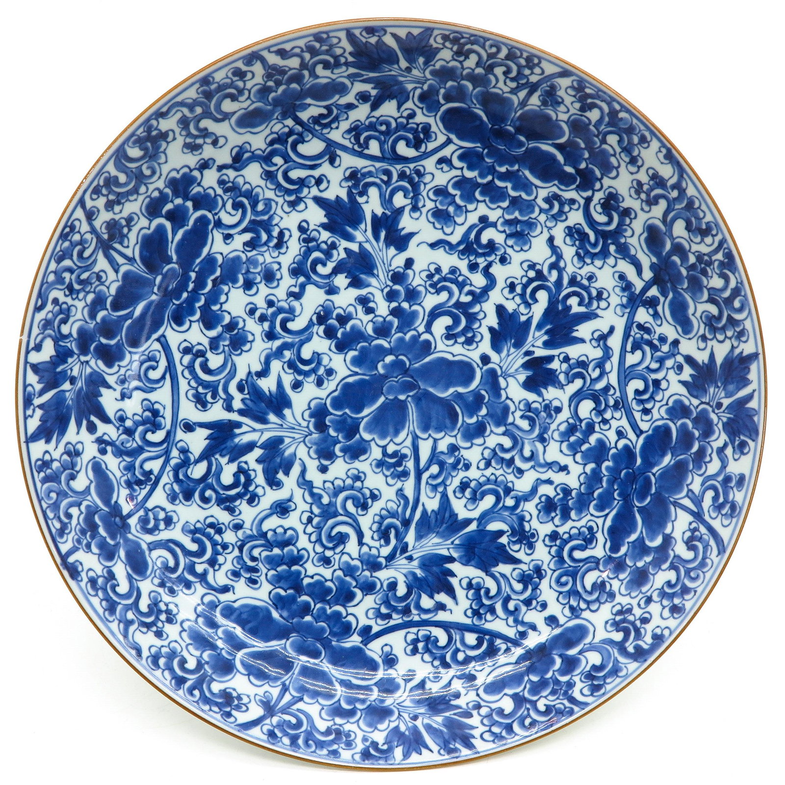 A Blue and White Charger: Floral decor, 18th Century, 37 cm. in diameter, hairline.