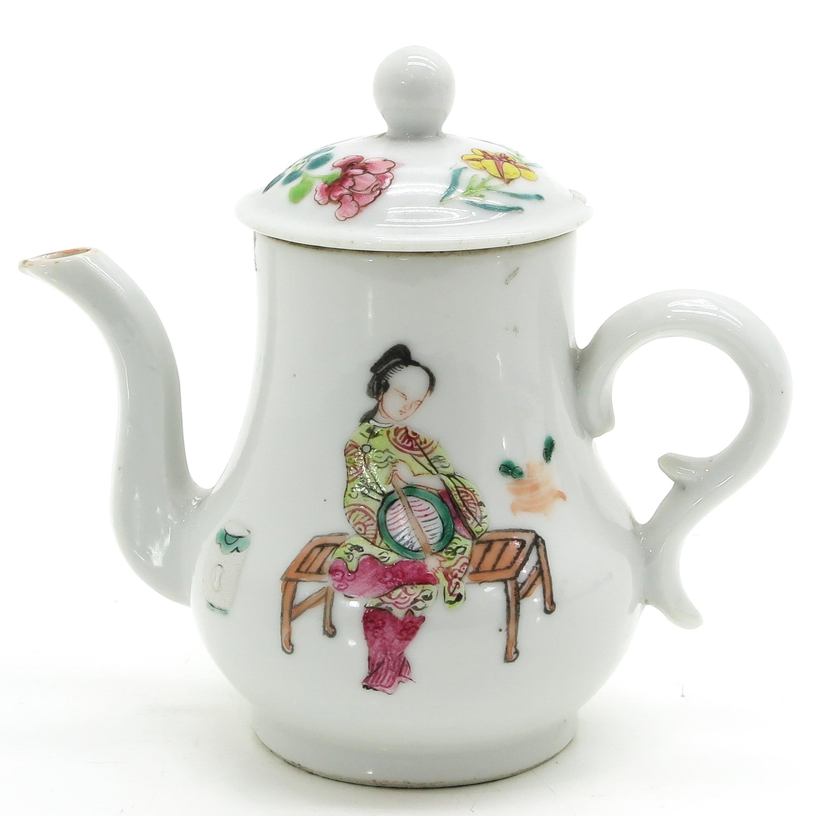 A Famille Rose Teapot: 18th Century, 10 cm. tall, chip on cover.