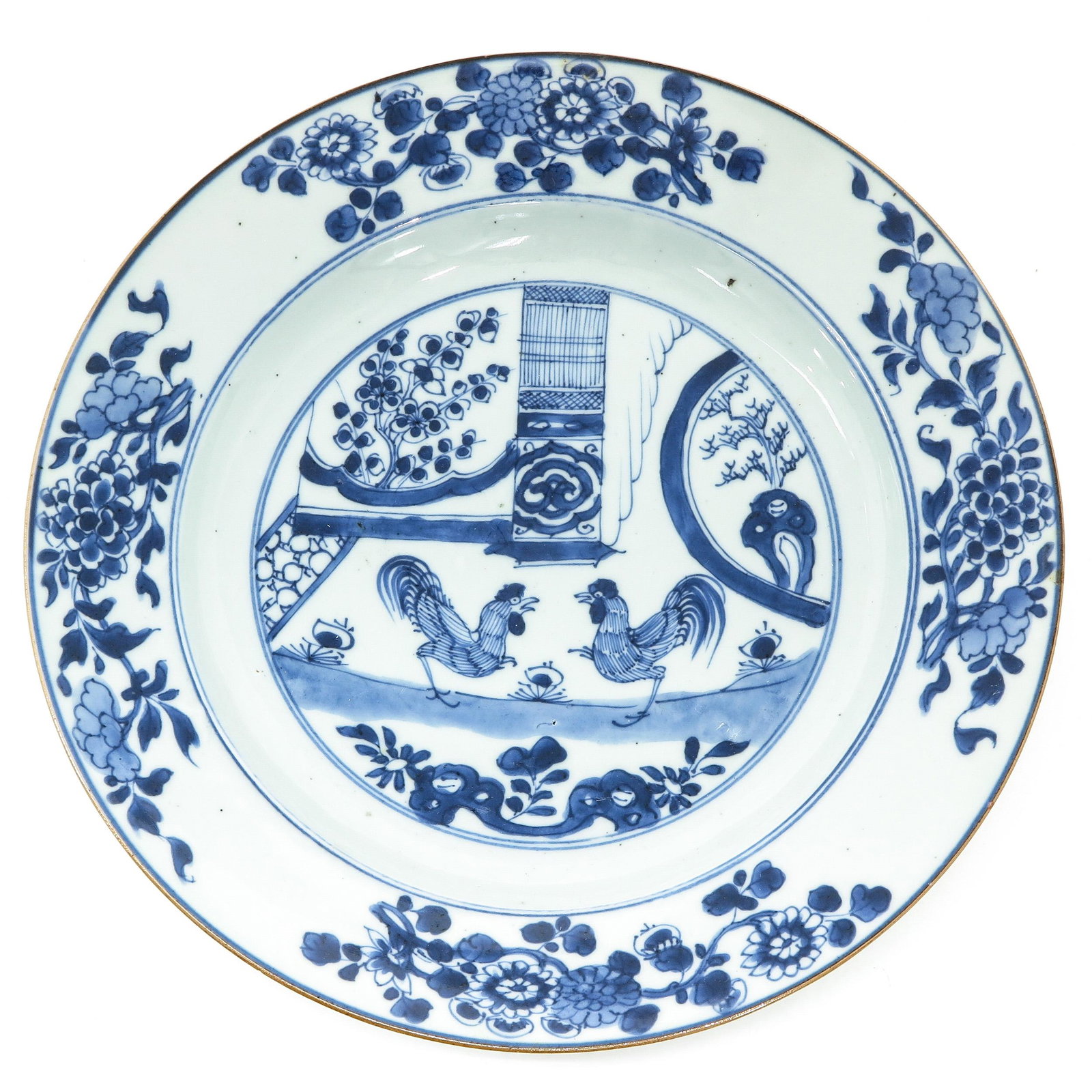 A Blue and White Plate: Depicting scene with roosters, 18th Century, 27 cm. in diameter.