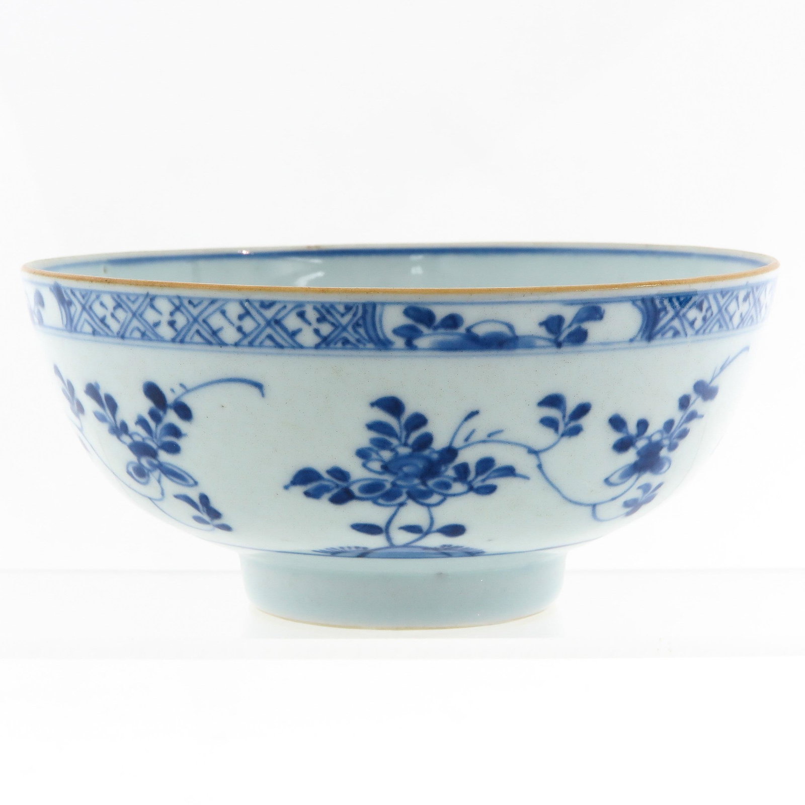 A Blue and White Bowl: Floral decor, 14 cm. in diameter.