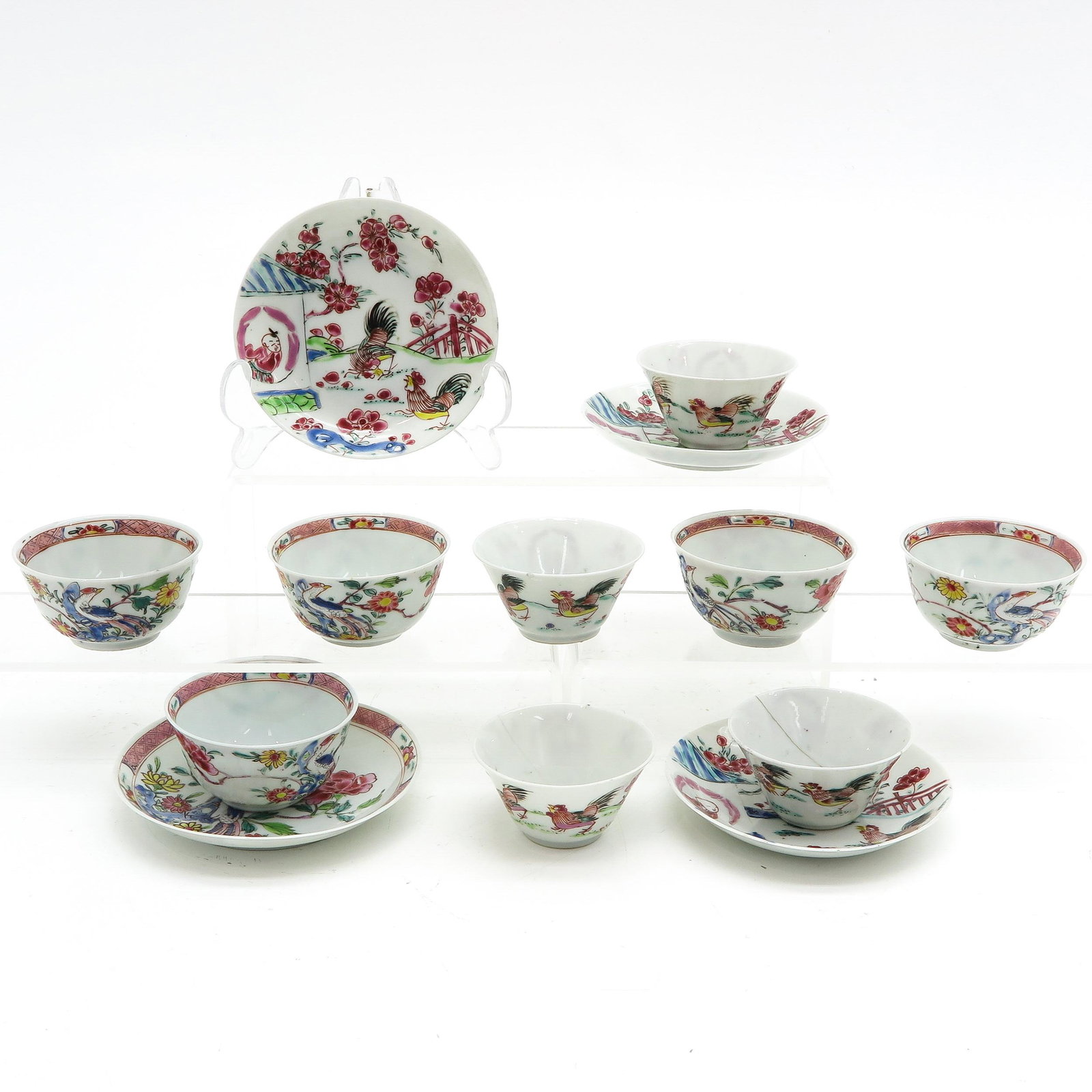 A Collection of Cups and Saucers: Including 9 cups and 4 saucers, largest saucers are 12 cm. in diameter, in diverse conditions.
