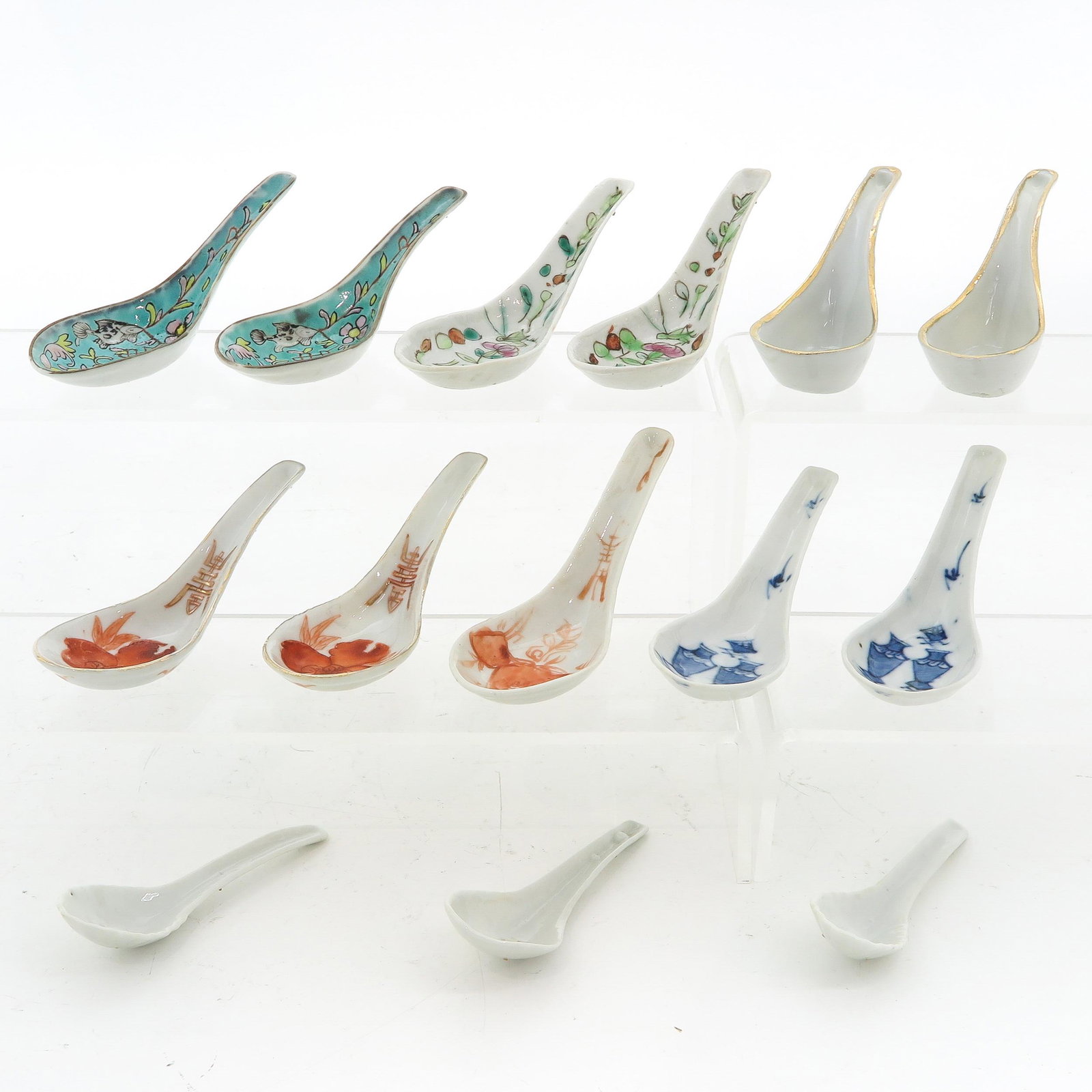 A Collection of 14 Spoons: 13 cm. long.