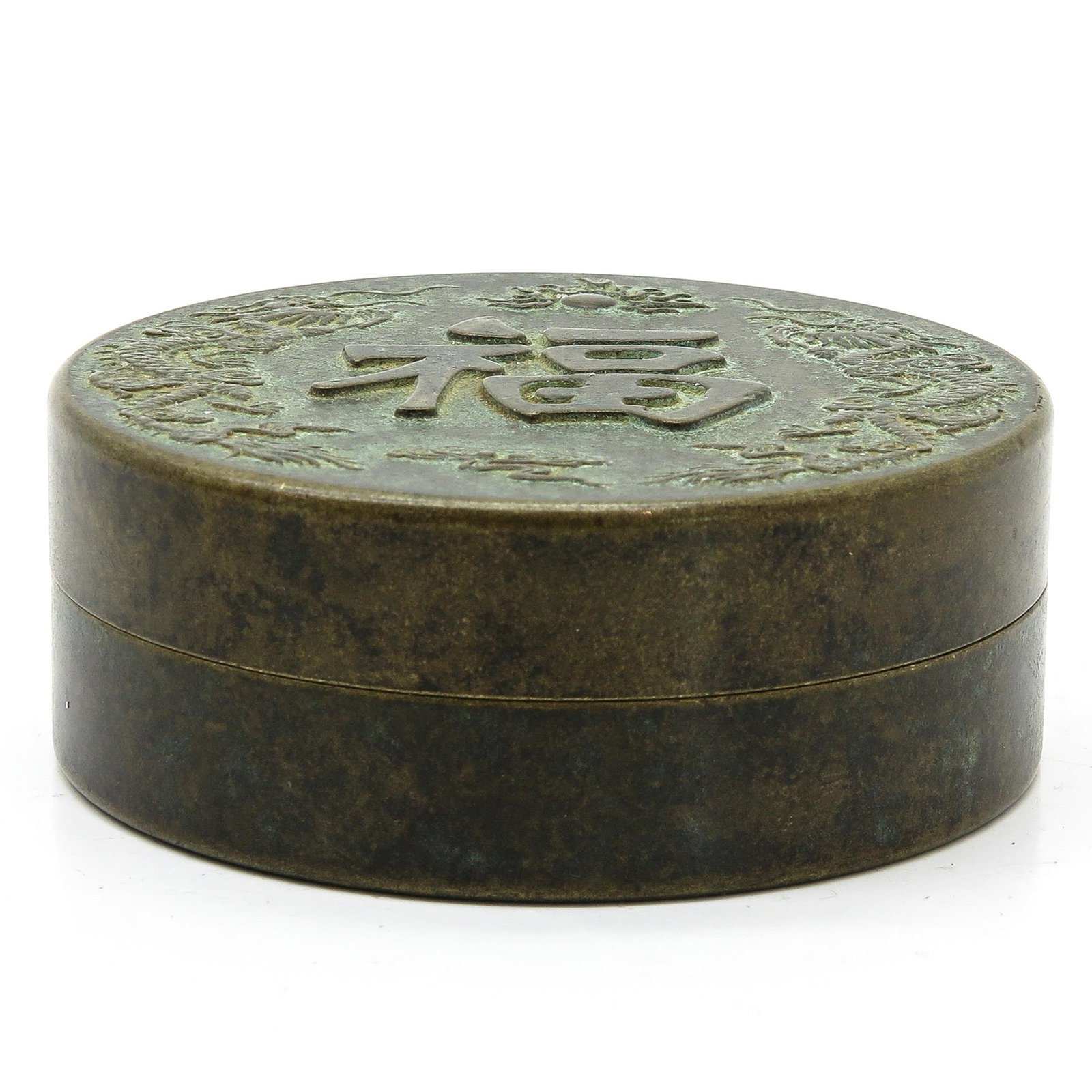 A Chinese Bronze Box: 7 cm. in diameter.