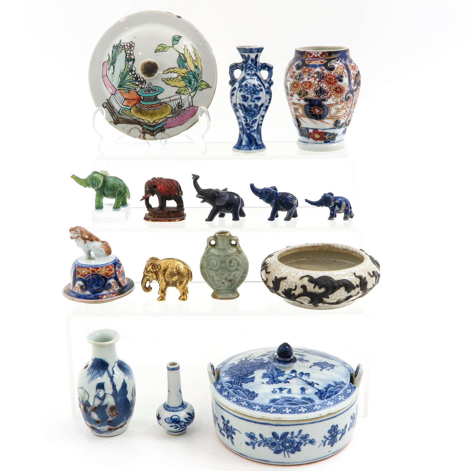 A Diverse Collection of Porcelain: Including celadon snuff bottle and blue and white butter dish circa 1800 13 cm. in diameter, in diverse conditions.