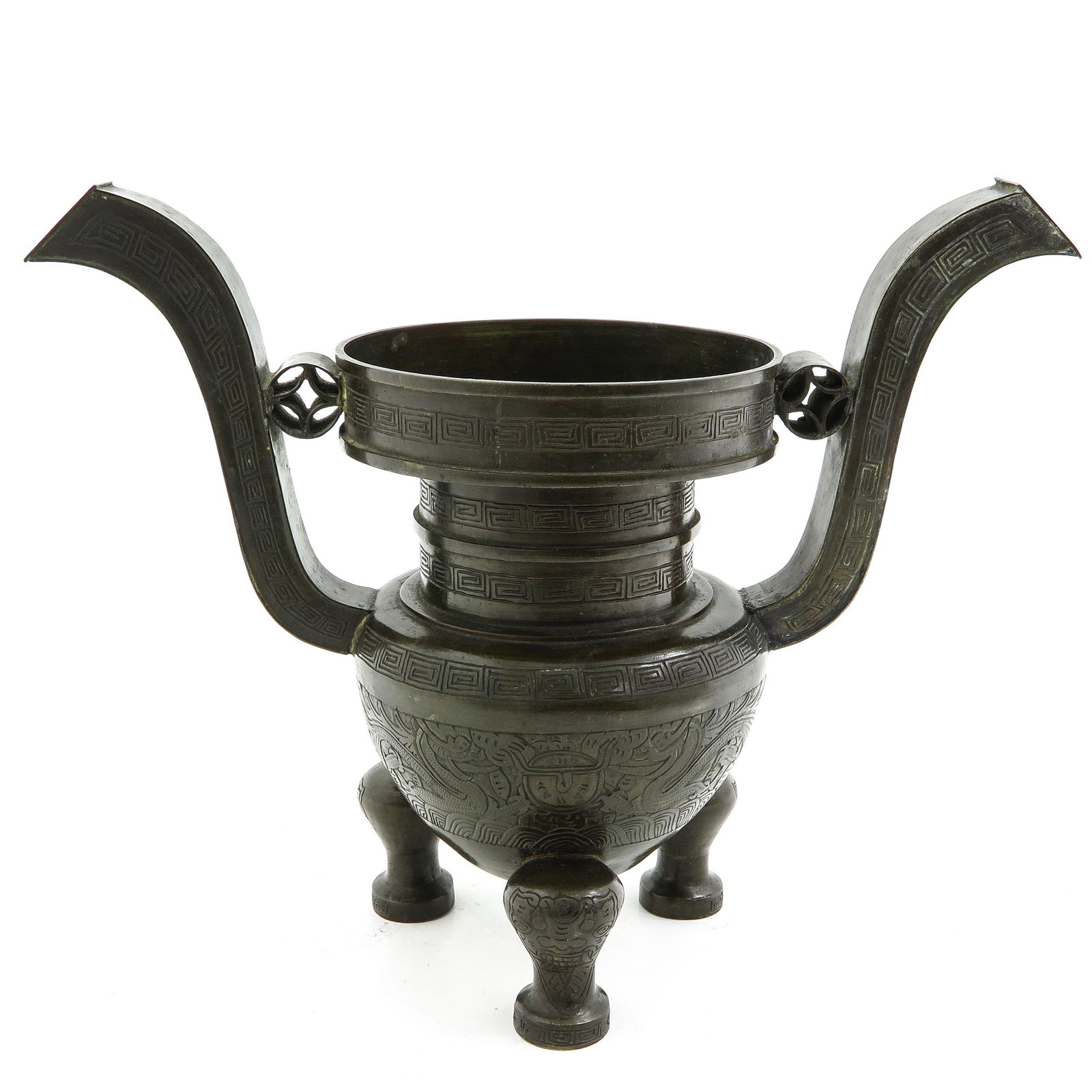 A Chinese Bronze Tripod Censer: 25 cm. tall.