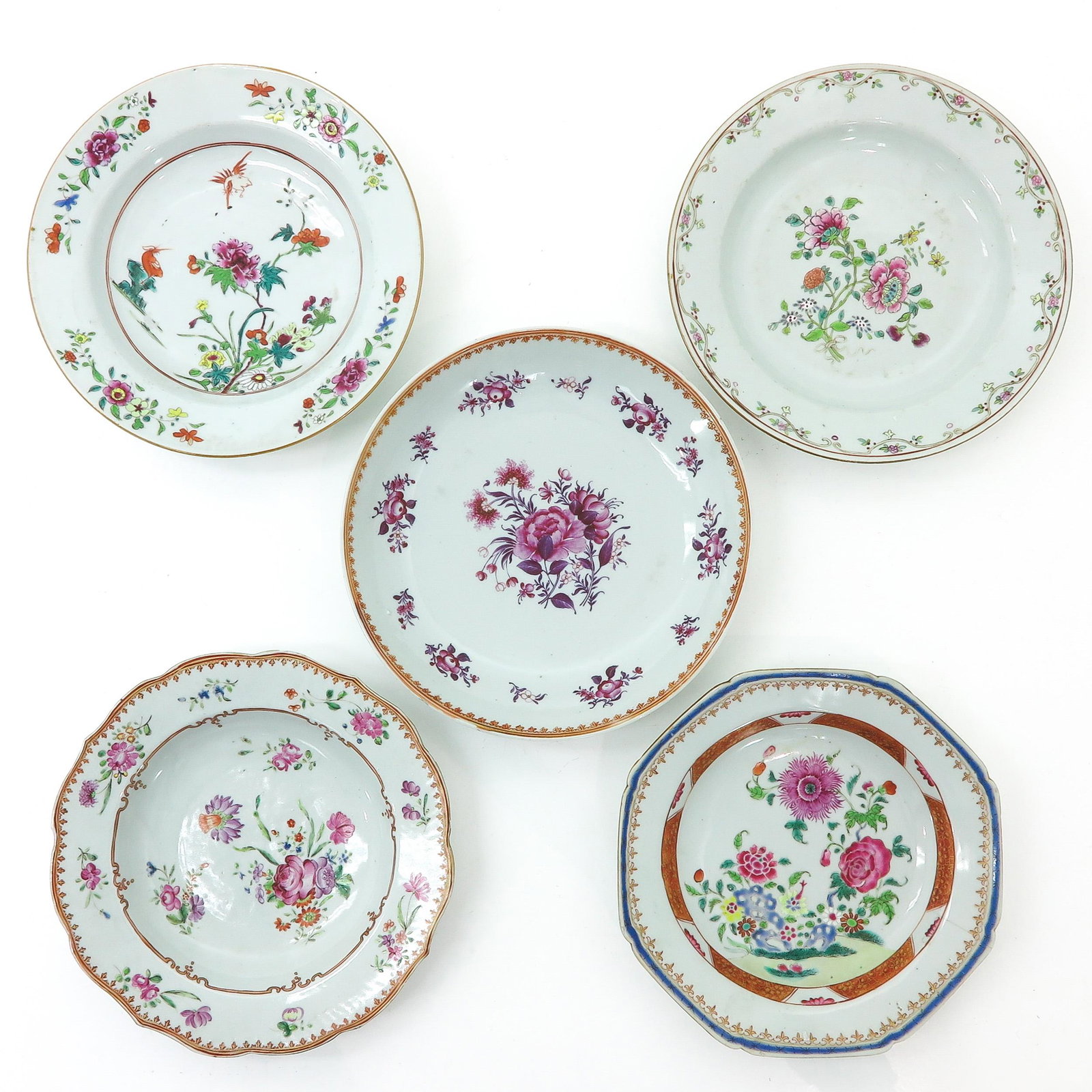 A Collection of 5 Plates: Diverse decors, 18th Century, 22 cm. in diameter, chip and hairline.