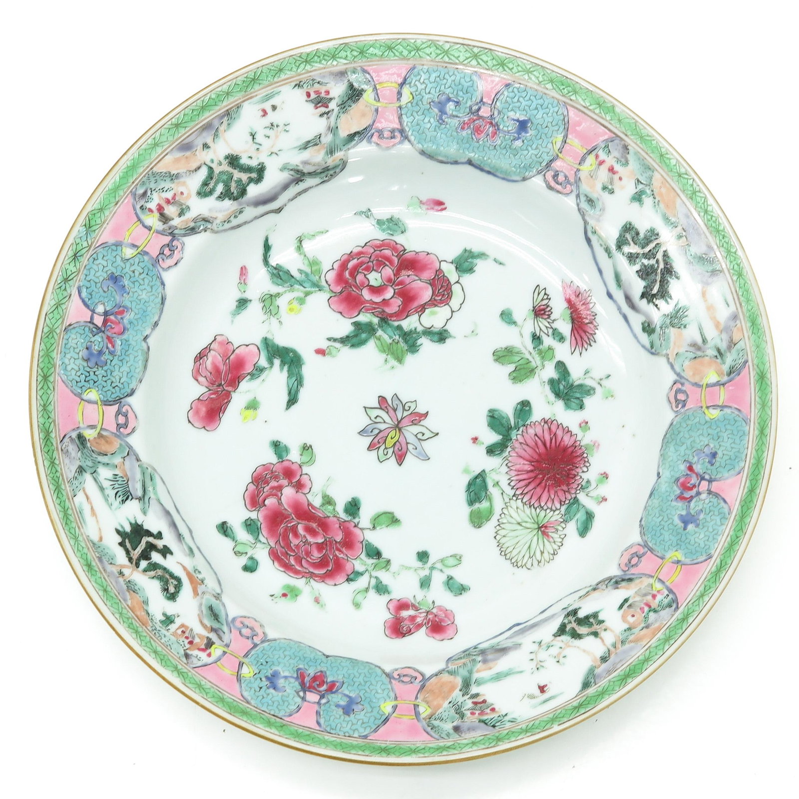 A Famille Rose Plate: Floral decor, 18th Century, 22 cm. in diameter, hairline.