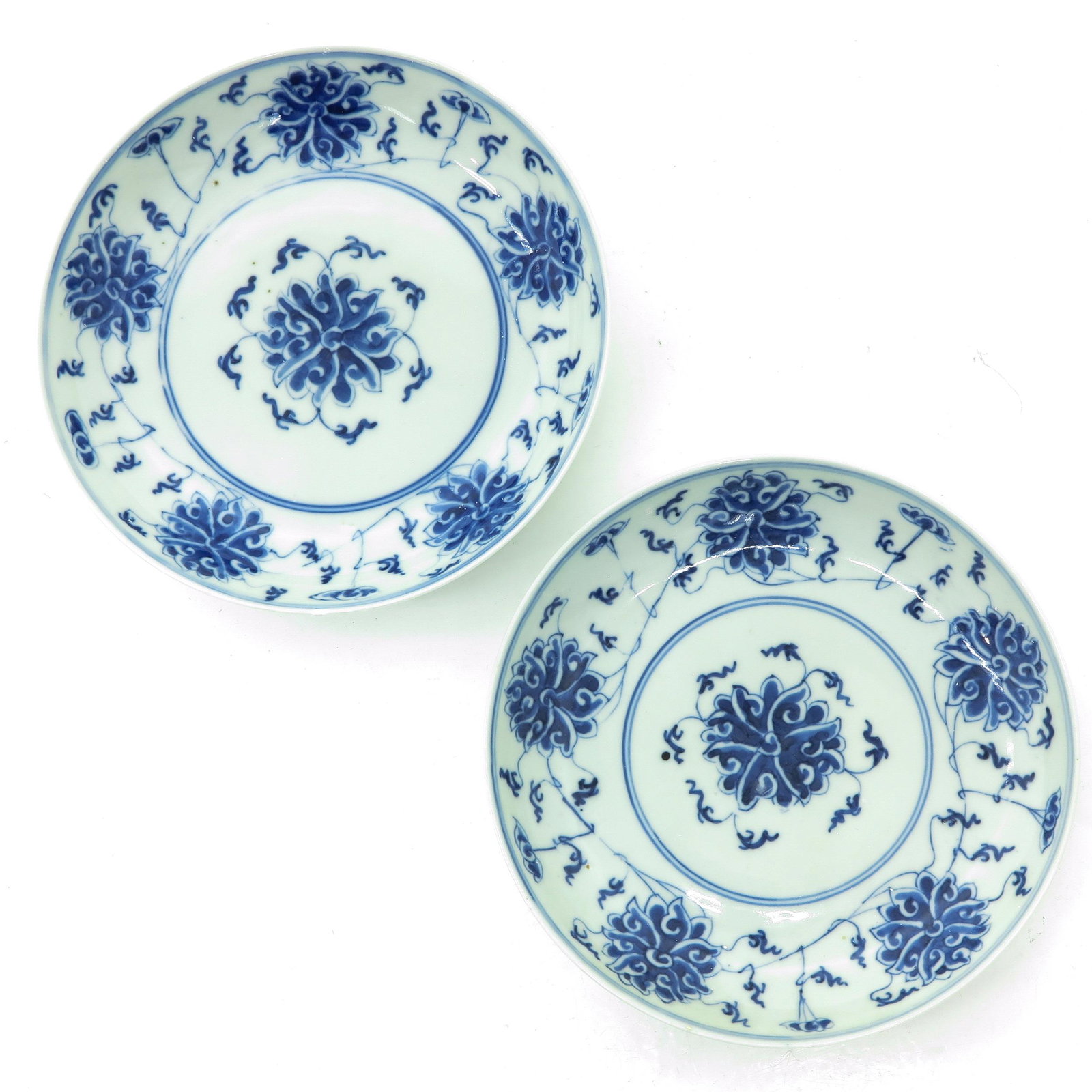 A Pair of Blue and White Plates: 18 cm. in diameter, Guangxu Mark and Period, chip and hairline.