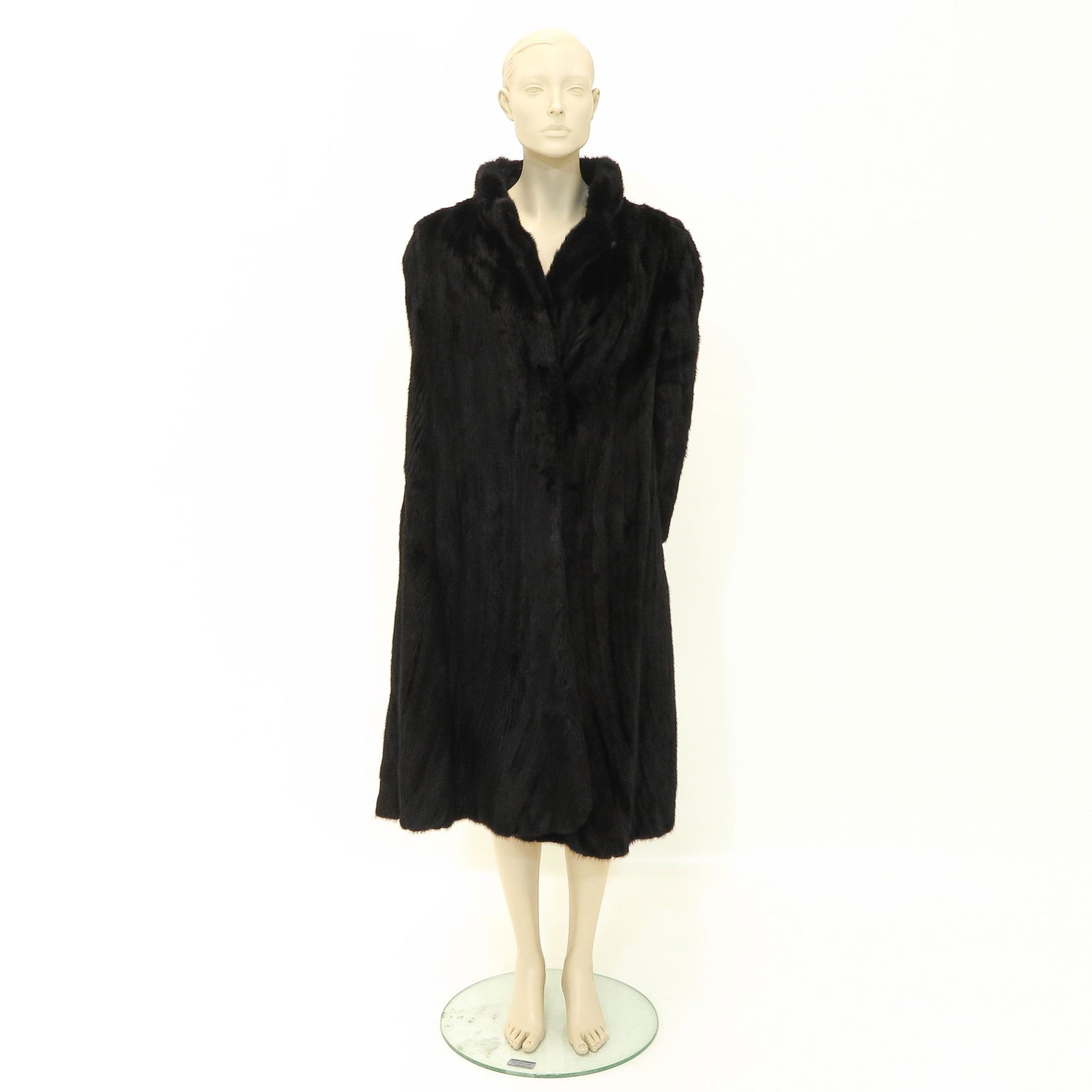 A Ladies Mink Stole: made of mink.