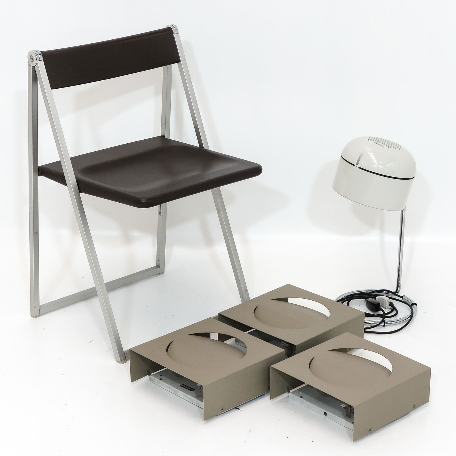 A Collection of Interlubke and Raak Designer Items: Consisting of folding chair, brand Interlubke, desk lamp and 3 wall lamps, brand Raak