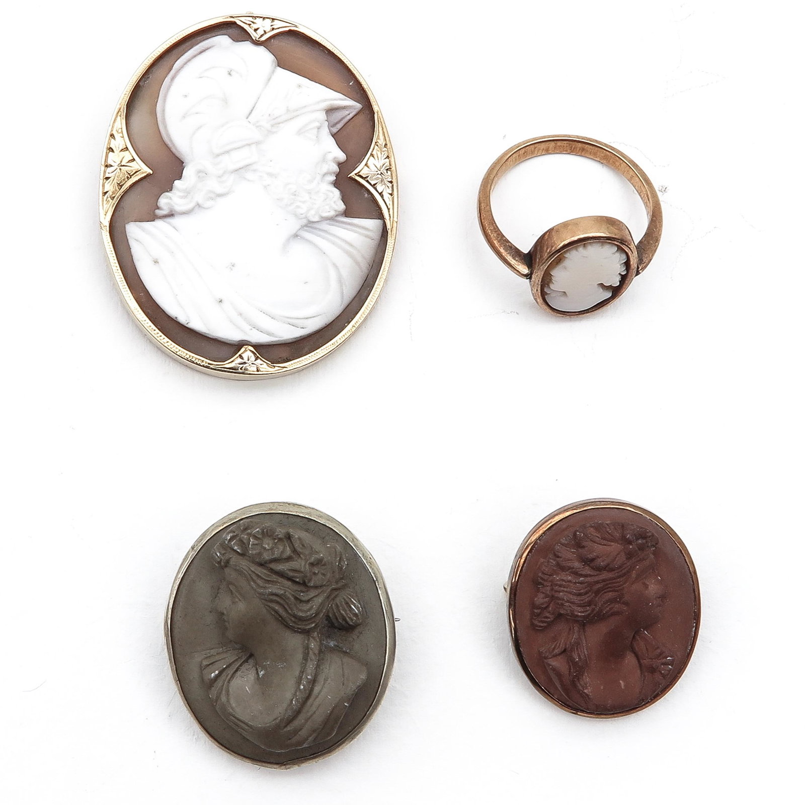 A Collection of Shell and Lava Cameo Jewelry: Some in gold frames