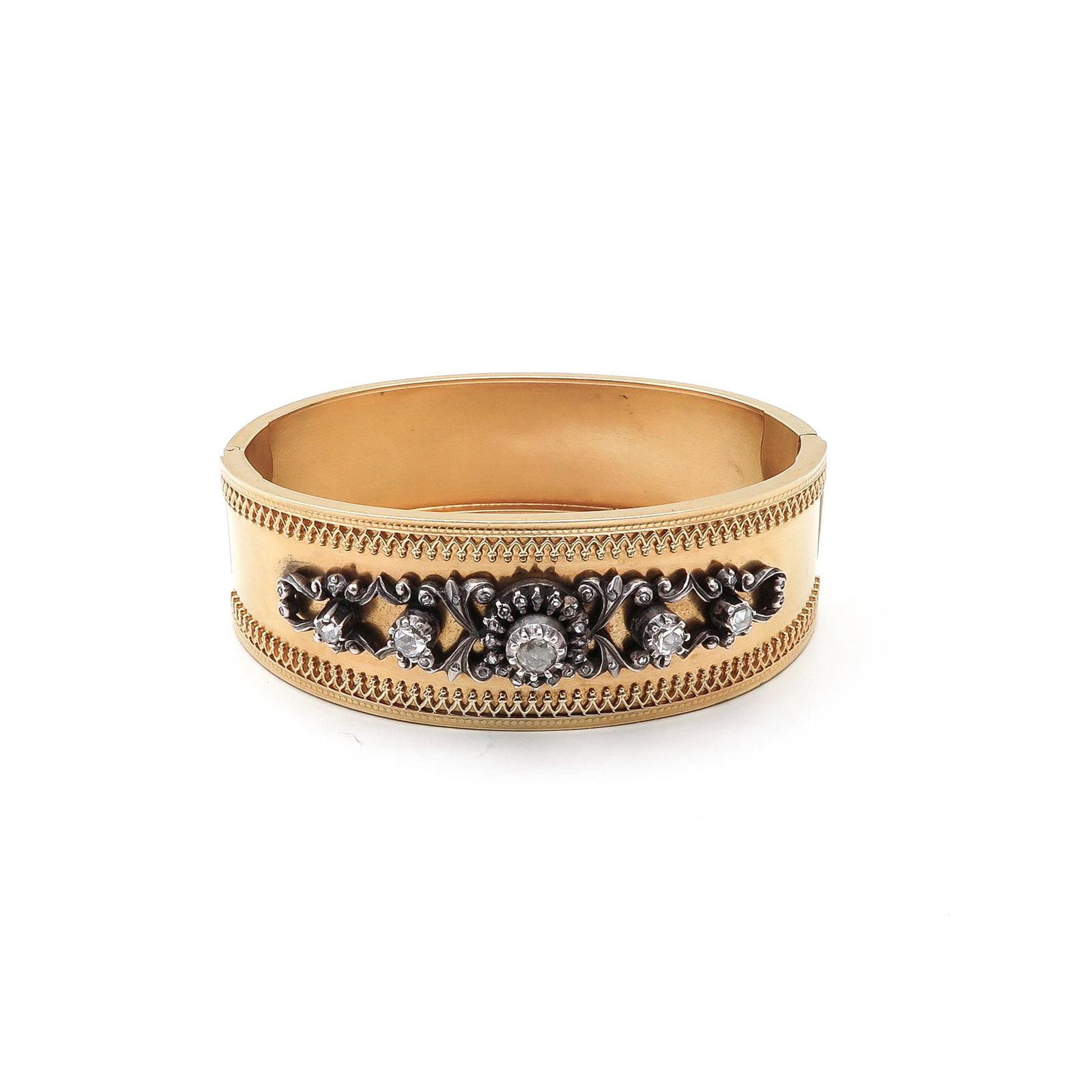 An 18KG Diamond Bracelet: Set with over 35 rose cut diamonds, largest diameter approx. 4.5 mm, weight 43 grams