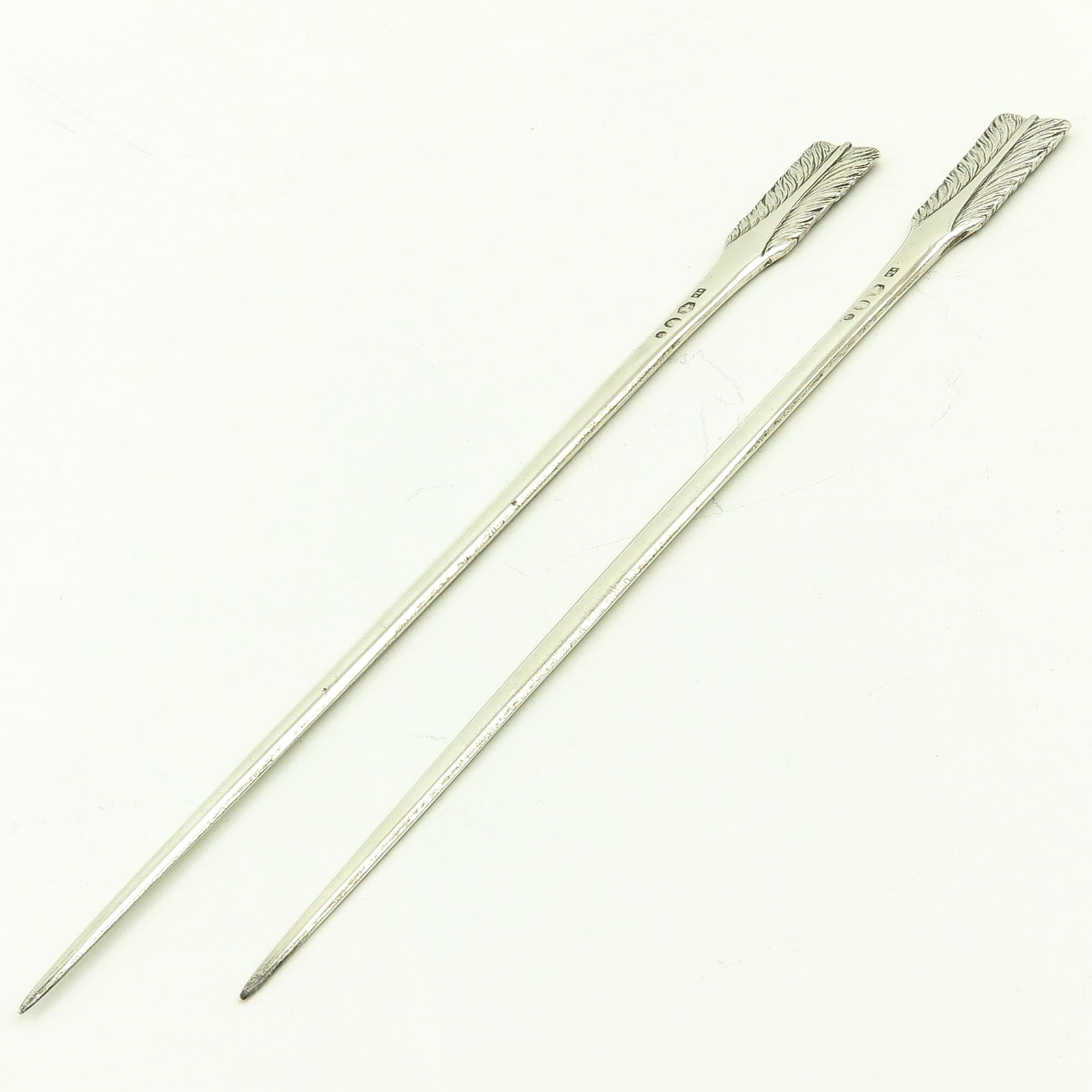 A Pair of Cocktail Prikkers: Holland, 1925, length 24 cm.